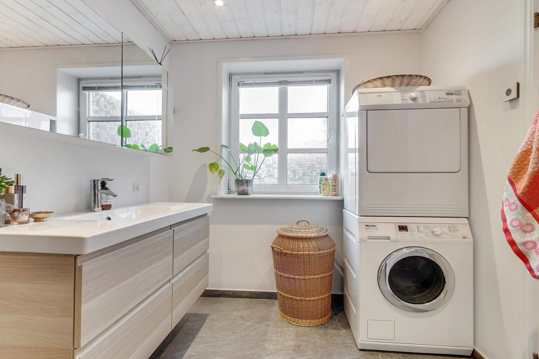 Kitchen(coffee machine, oven, microwave, dishwasher, fridge, fridge-freezer), Living/bed room(TV(danish TV channels (DR1 and TV2)), chromecast), bedroom(double bed), bedroom(double bed), bathroom(tumble dryer, washbasin, shower, toilet, washing machine), garden furniture