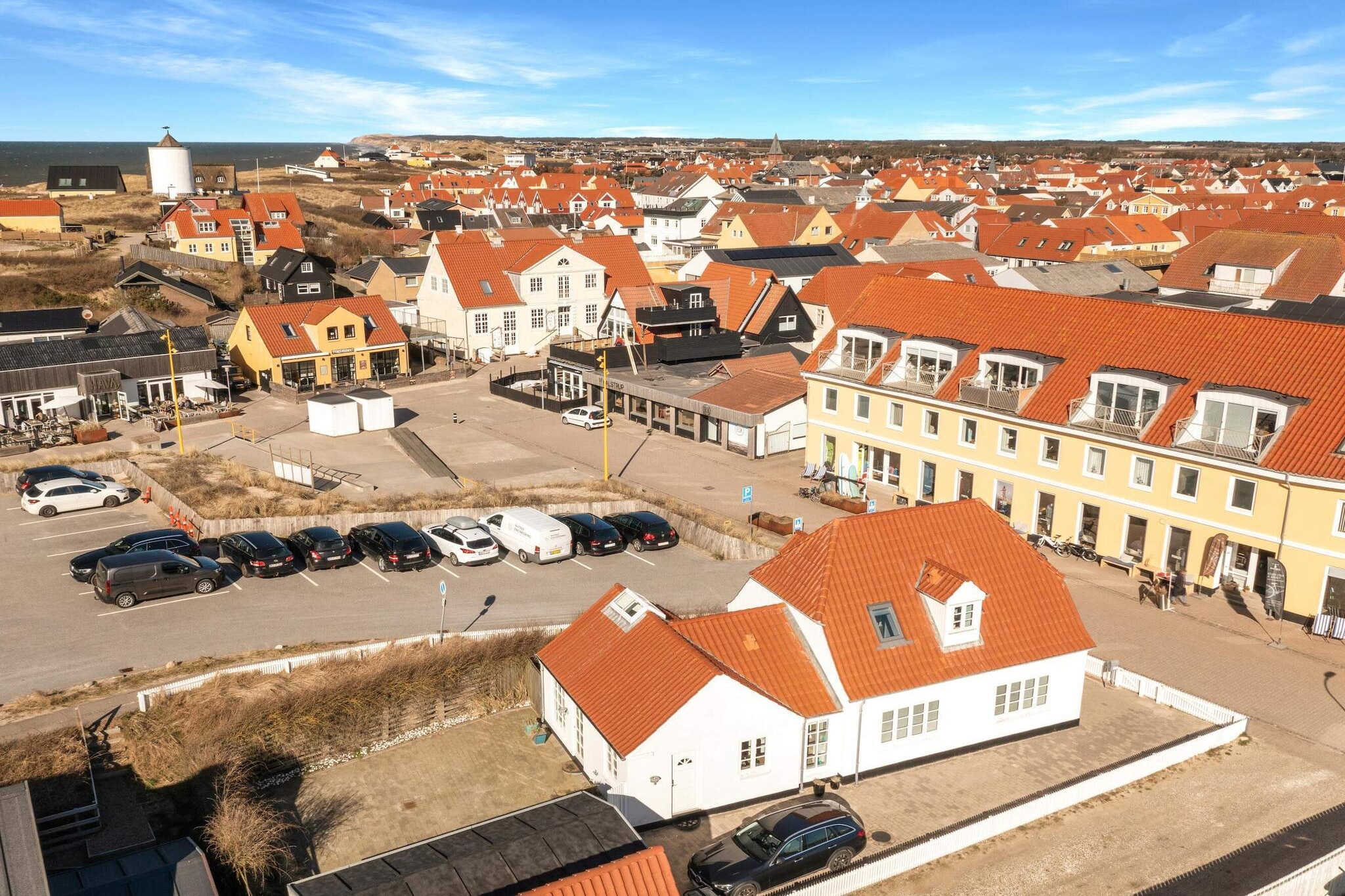 Kitchen(oven, microwave, dishwasher, fridge, fridge-freezer), Living/bed room(TV(danish TV channels (DR1 and TV2))), bedroom(double bed), bedroom(double bed), bedroom(double bed), bathroom(tumble dryer, washbasin, shower, toilet, washing machine), garden furniture, sun loungers