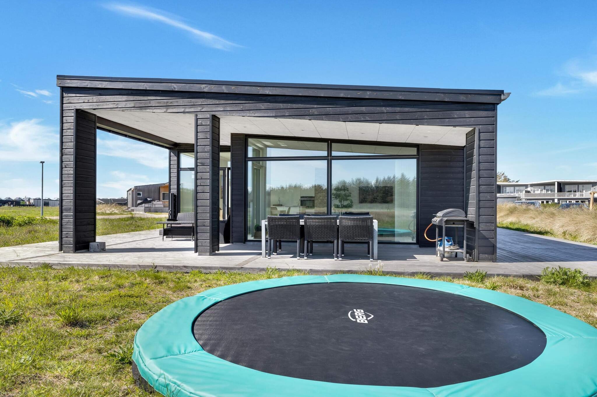 Kitchen(cooker(electric), cooker(2 ring stoves), coffee machine, oven, microwave, dishwasher, fridge, fridge-freezer), Living/bed room(TV(danish TV channels (DR1 and TV2)), chromecast), bedroom(single bed, double bed), bedroom(single bed, double bed), bedroom(double bed), bathroom(tumble dryer, washbasin, shower, toilet, washing machine), bathroom(washbasin, shower, toilet), garden furniture, sun loungers, table tennis table, billiards