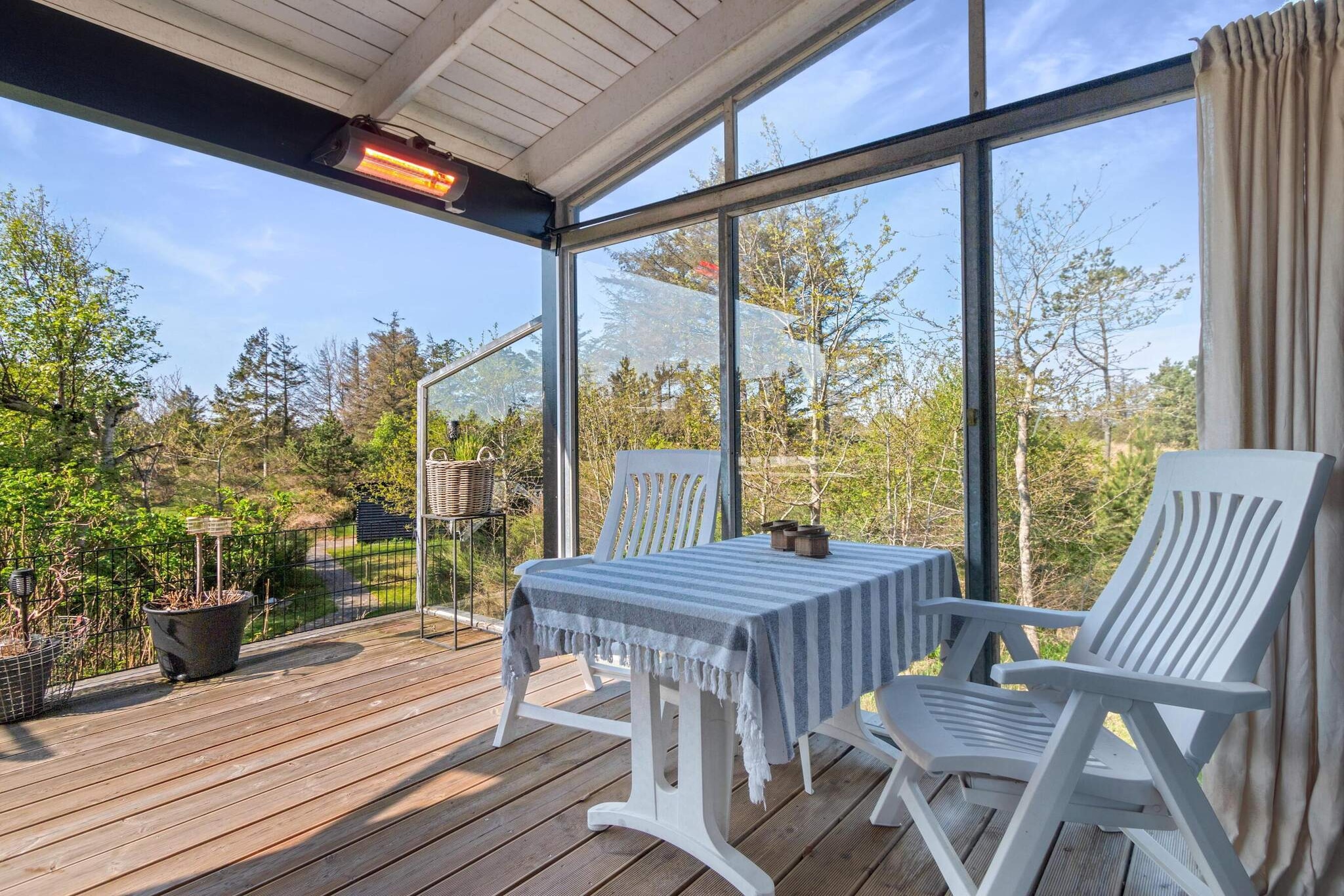 Kitchen(cooker(electric), cooker(2 ring stoves), coffee machine, oven, microwave, dishwasher, fridge, fridge-freezer), Living/bed room(TV(danish TV channels (DR1 and TV2)), chromecast), bedroom(double bed, TV(danish TV channels (DR1 and TV2))), bedroom(4x single bed), bedroom(double bed), bathroom(tumble dryer, washbasin, shower, toilet, washing machine), garden furniture