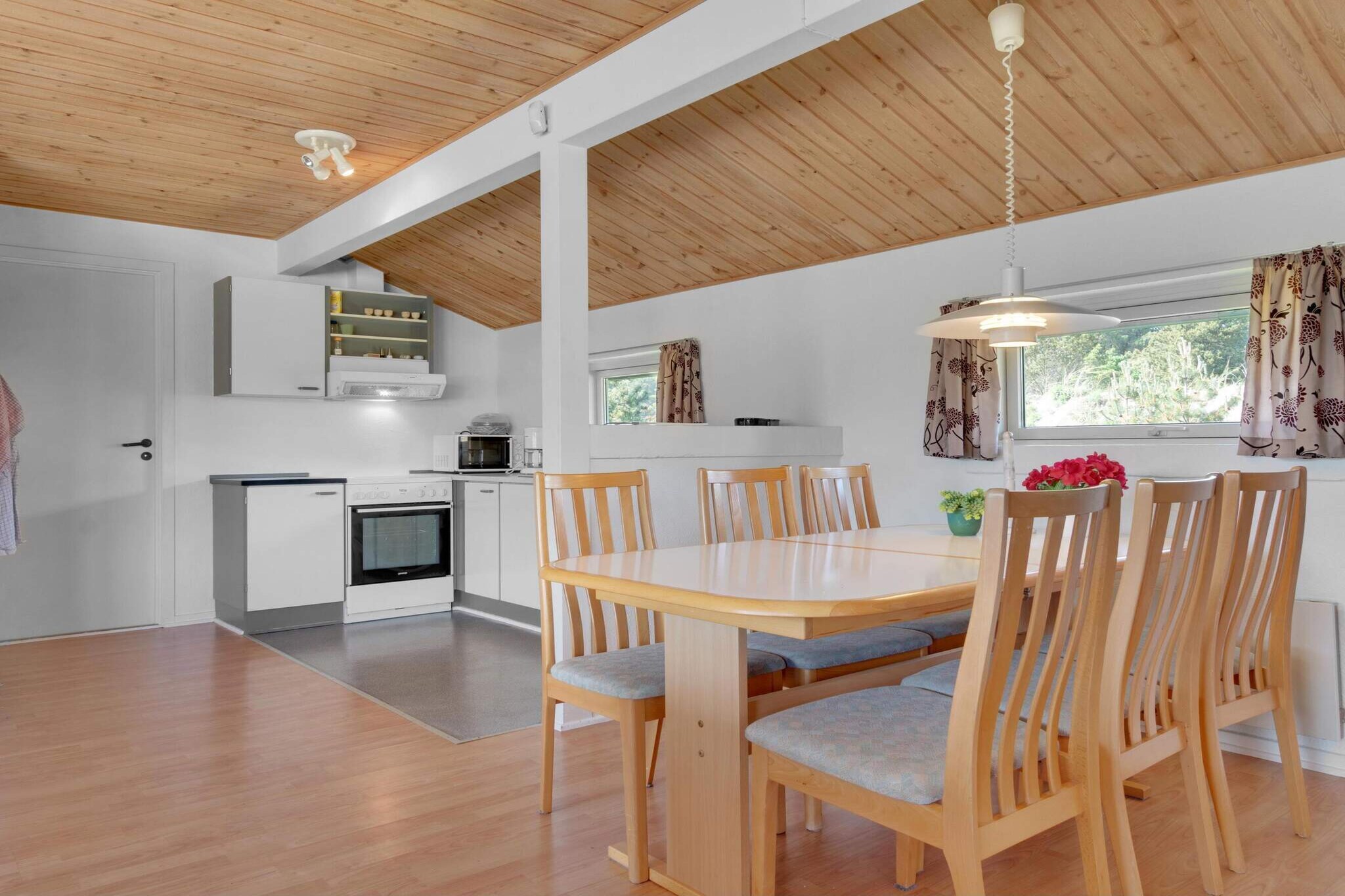 This environmentally friendly holiday home prioritizes green energy, featuring solar panels and sustainable living throughout. Situated just 2.3 km from the famous Fårup Sommerland amusement park and the wide, sandy beach of Blokhus, the house offers a perfect blend of relaxation and adventure. Whether you’re seeking thrills or peace, the location is ideal for both. The home is designed with comfort in mind, with all rooms located on one level. It includes a cozy kitchen-dining area, a lovely living room, and three well-appointed bedrooms, offering ample space for 6 guests. The bathroom comes complete with a sauna and spa, allowing you to unwind in style after a day of exploration. Outside, you can enjoy the beautiful natural surroundings of the summer house. The house's location ensures you’re close to the center of Løkken and Blokhus, yet far enough from the hustle and bustle for a tranquil retreat. The spacious outdoor area is perfect for soaking up the sun and enjoying the serene atmosphere. Please note, the cottage is non-smoking and youth groups are not allowed. Be sure to order linen packages when booking to avoid extra administration fees.