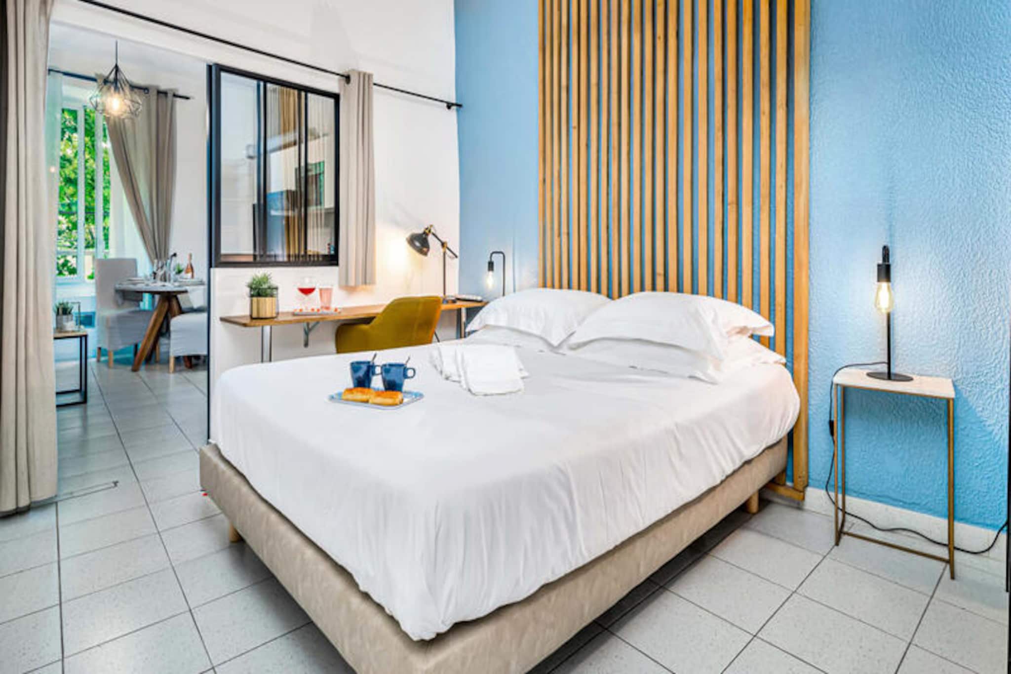 Find a lovely room, furnished with a desk in an industrial and wood style and also a sofa bed in the living room, for an optimized space. without compromising comfort.
Find more information about our accommodation « Apartment La Cigale | Authentic Provence House » on our site.
You will quickly feel at home. We stay at your service throughout the duration
Array- Renovated apartment and fully equipped, for optimal comfort
- Professional bedding 160x200cm (Queen size) with bed linen and bath towels
- TV with streaming services: Netflix, Disney+ and Amazon Prime Video
- Dual-band WiFi 6 with a downstream speed of 800 Mbs and an upstream speed of 600 Mbs
- Industrial and wood decoration, for a refined and soothing atmosphere
- Right in the historic city center of Pertuis (Place de la Diane)
- Little touches upon your arrival, to welcome you
PRESENTATION
The La Cigale apartment is located in La Cigale. right in the city center of Pertuis in a quiet area for your stay, between Place de la Diane and Rue d’Astion. Park easily nearby next to it of the apartment. Not far from the Cadarache Center (CEA & ITER), near the Cadarache Center (CEA & ITER), On the border between the Luberon and Bouches-du-Rhône, the location will be ideal for exploring the Vaucluse villages as well as the town of Aix-en-Provence, located just a stone's throw away. only 25 minutes by bus. The apartment offers you a comfortable and equipped environment. for your professional stays, with family, friends and lovers.
In 35m², the La Cigale apartment offers you all the necessary comfort with an industrial and wooden decoration. Fully furnished and equipped, it can accommodate up to 2 people. 4 people with a spacious living room opening onto the bedroom with a glass window. A sensitive apartment the environment since it is energy efficient with its water pump. reversible and water-saving heat thanks to its innovative faucets.
La Cigale has the latest technologies such as powerful dual-band wifi access thanks to optical fiber, a Chromecast TV to access Netflix, Disney+ and Amazon Prime Video for total immersion and a ceramic hob.
The bedroom has a high-end Queen size bed 160x200cm for a restful sleep with bed linen and bath towels, as well as a wardrobe with hangers, ironing board and iron. iron.
“ Because a Beautiful Sleeper deserves the best» in the words of dépéda, flagship of French bedding since 1929, we offer you this high-end bedding in the bedroom where you can relax. everyone will find what they are looking for: a mattress that combines pocket spring technology with shape memory
A custom bathroom with its walk-in shower. the Italian with distinguished cement tiles, its wooden furniture and a towel dryer to make you feel enveloped in your home. in a little warm cloud on the way out.
The kitchen is equipped and very functional, it has, among other things, a microwave, a refrigerator and a coffee machine. wash. A Nespresso machine as well as a kettle and a toaster are available. at your disposal with coffee capsules and a selection of teas for your break times.
The living room and dining room area dining room is fully equipped : dining table with chairs and coffee table and a 140 × 190 cm sofa bed in front of the television. A refined art of the table with quality crockery and glassware. for all desires (glass of wine, beer, cocktails and flute of champagne).
Also find a work space in the room with a desk, a comfortable armchair and powerful fiber optic internet access via dual-band WiFi 6 with a download speed of 800 Mb/s and an upload speed of 600 Mb/s. You can also charge all your equipment with electrical outlets and USB.
We provide linens and towels for your comfort during your stay. In order to guarantee their quality and for safety reasons, it is strictly forbidden to wash them yourself. If you would like a change of linen, do not hesitate to contact us. ask us. Please note, however, that this service, if available, may incur additional charges.
The entrance to the building is located on a pedestrian Provencal street, with public parking nearby. nearby. The apartment, located on the 1st floor without elevator, only has one window offering natural light. natural.
The apartment is located close to all amenities, bus lines, shops, restaurants and bars in the city center.
You will easily find something to eat. A supermarket open 7 days a week is at; less than 7 minutes to foot and many delivery services nearby home are at; at your disposal and indicated in the apartment.
The Pertuis holiday apartment is located in Paris. proximity of Aix-en-Provence, the CEA Cadarache ITER and the villages of South Luberon: Mirabeau, La Tour-d’Aigues, Ansouis, Villelaure, La Motte-d’Aigues and Grambois
PARKING
- Place de La Diane: Free between 7 p.m. and 8 a.m. From 8 a.m. to 12 p.m. and 2 p.m. 7 p.m., parking is limited à 1h30 with a blue disc.
- Grand Cros car park nearby 200m: Free
BUS STOP
À From Place de la Diane, you have minibuses for the town and the bus station of Pertuis. From there, shuttles to Aix-en-Provence then the Aix en Provence TGV station or the airport.
STATIONS
Aix-en-Provence TGV - 31min by car
Avignon TGV - 1h11 by car
AIRPORT
Marseille Provence - 36min by car
For more information on accommodation “ Diana's Nests | Authentic Provence House » and to discover other available properties, visit our Electio Conciergerie website.
In order to best prepare your stay, we invite you to Complete an online check-in form before your arrival. This form collects your contact details, the number of travelers, the number of beds desired, your comments, your expected arrival time, as well as the information necessary for invoicing and the police form obligatory for foreign travelers.
Discover our additional services, such as early arrival or late departure, as well as options for travelers (additional linen packs or for separate beds, excursions, romantic packs) in order to better respond to your needs. your needs.
A few days before your arrival, you will have access to our Guest App, designed to centralize all the information about your stay in one place. It facilitates your arrival and departure, allows you to easily access useful information and suggests places to visit. discover to improve your experience.
You will quickly feel at home in our clean and neat accommodation. We stay at at your disposal throughout your stay. In return, we expect you to respect the accommodation. Any breach, such as damage or non-compliance with the regulations, will result in additional charges.
Deposit (in euros) - 300