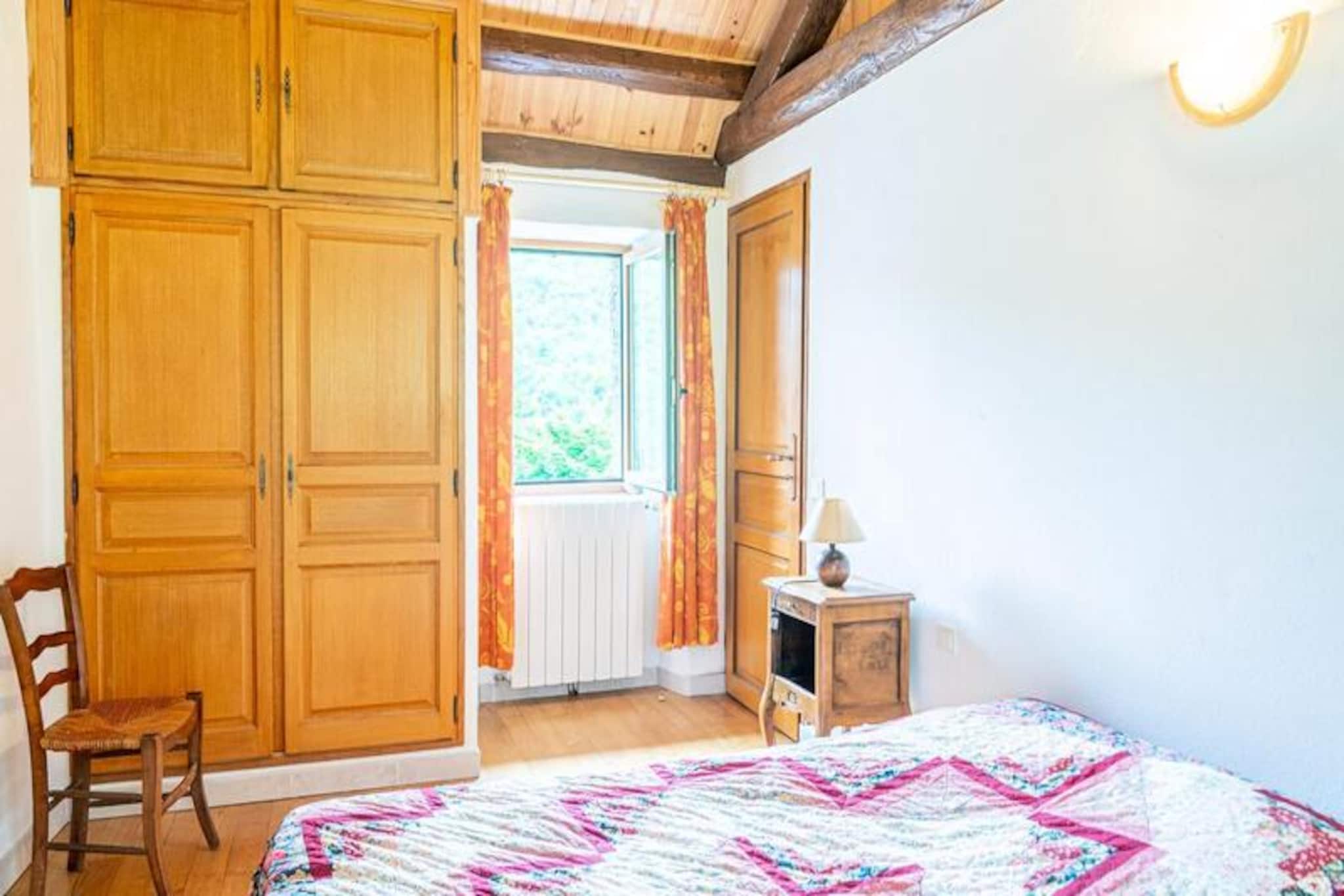 This charming holiday home offers a cozy and comfortable stay, ideal for families or small groups. It features two bedrooms with 140x190 cm beds, providing ample space for a restful sleep. Additionally, the mezzanine level offers an extra 140x190 cm bed, making it perfect for additional guests. The property is pet-friendly, allowing you to bring your furry companions along. A WC is conveniently located on the ground floor, and the home is well-suited for those looking for a quiet getaway in nature.
Located in a picturesque setting, the property is surrounded by the natural beauty of the Cיvennes. Guests can explore local attractions such as hiking trails, the stunning landscapes of the Cיvennes National Park, and the historic villages nearby. A range of cafes and markets are accessible, with the nearest supermarket located just a short drive away, ensuring you have everything you need during your stay.
The property is fully equipped for a self-catering stay. The kitchen comes with a dishwasher, oven, microwave, refrigerator, and freezer, offering everything you need to prepare meals. The spacious living area has a cozy fireplace, perfect for relaxing in the cooler evenings. Outside, you can enjoy the terrace with a garden table, chairs, and a barbecue, perfect for dining al fresco while enjoying the serene surroundings.