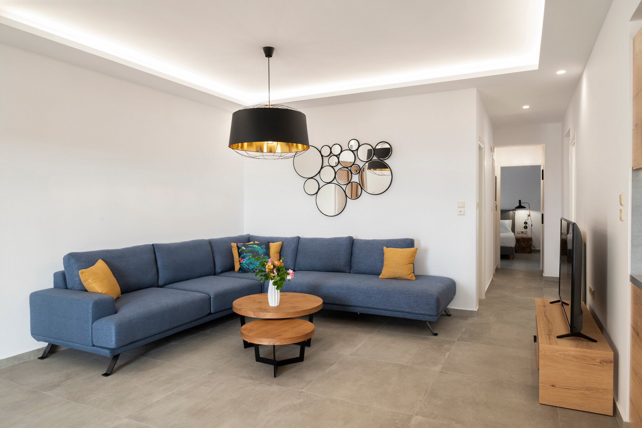 This spacious 4-bedroom apartment in Nea Magnisia offers comfortable accommodation for up to 8 guests, with 165 mÂ² of living space. The property is fully equipped, featuring stunning views of both the mountains and the garden. It's perfect for families or groups, providing a tranquil retreat while still being close to essential amenities. The apartment includes a communal swimming pool, terrace with outdoor furniture, and a hot tub for added relaxation.

The apartment is ideally located, just 1 km from the local beach, supermarket, and taverns, ensuring easy access to everything you need during your stay. The vibrant city of Rethymno is 10 km away, offering a wide range of shops, restaurants, and cultural attractions. Heraklion Airport is 70 km from the property, providing convenient travel access. Set in a family-friendly zone within a beautiful rural area, this apartment allows guests to enjoy the peace and quiet while being close to local conveniences.

The open-plan kitchen is fully equipped with modern appliances, including a refrigerator, microwave, oven, freezer, dishwasher, coffee machine, toaster, kettle, juicer, and all necessary kitchenware. Additional amenities include a washing machine, dryer, iron, hair dryer, safe, Wi-Fi, air conditioning, central heating, and a balcony. The apartment also has an open-air parking space in the adjoining building, ensuring convenience and comfort throughout your stay.