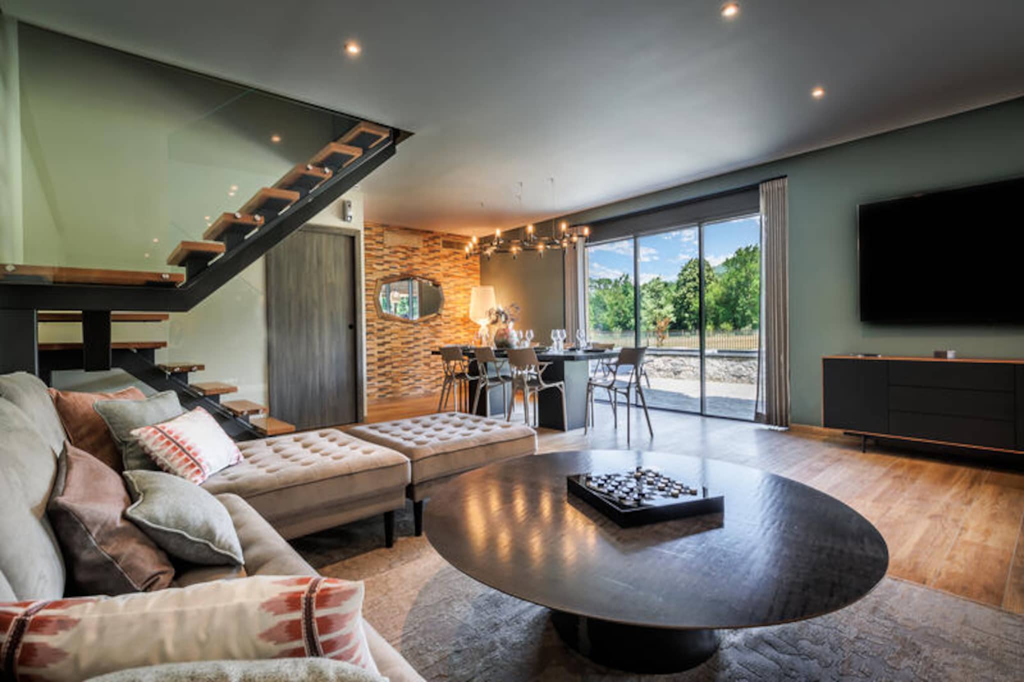 Located less than a kilometer from the Pyrenees Animal Park, the establishment offers you the opportunity to stay in two villas that can accommodate the whole family or your reunion with friends, all in the fresh air and in a green setting.



The location is ideal for a visit to the Parc Animalier des Pyrénées, which has over 120 different species. You will be seduced by the calm and the breathtaking view of the Pyrenean peaks.



You have the choice between two exceptional accommodations: La Grange, an old barn renovated with noble materials or Le Moulin, with modern decoration mixing wood and colorful details.

	Living room, Dining room
	Fully equipped kitchen
	3 master suites with king size beds
	1 dormitory with 2x2 single bunk beds
	4 shower rooms
	2 separate toilets
	Terrace
	Petanque court
	Hut for children


Wifi access - free
Deposit (additional) - 500
Bed linen - included
Bathroom linen - included
End of stay cleaning - extra €150/accommodation for 6 people - €200/accommodation for 10 people (compulsory)
Parking - free
Tourist tax (additional charge) - to be paid on site according to the current rate
End of stay cleaning - €200/accommodation (obligatory)
Heated swimming pool - heated swimming pool from April to September
Deposit (in euros) - 500
