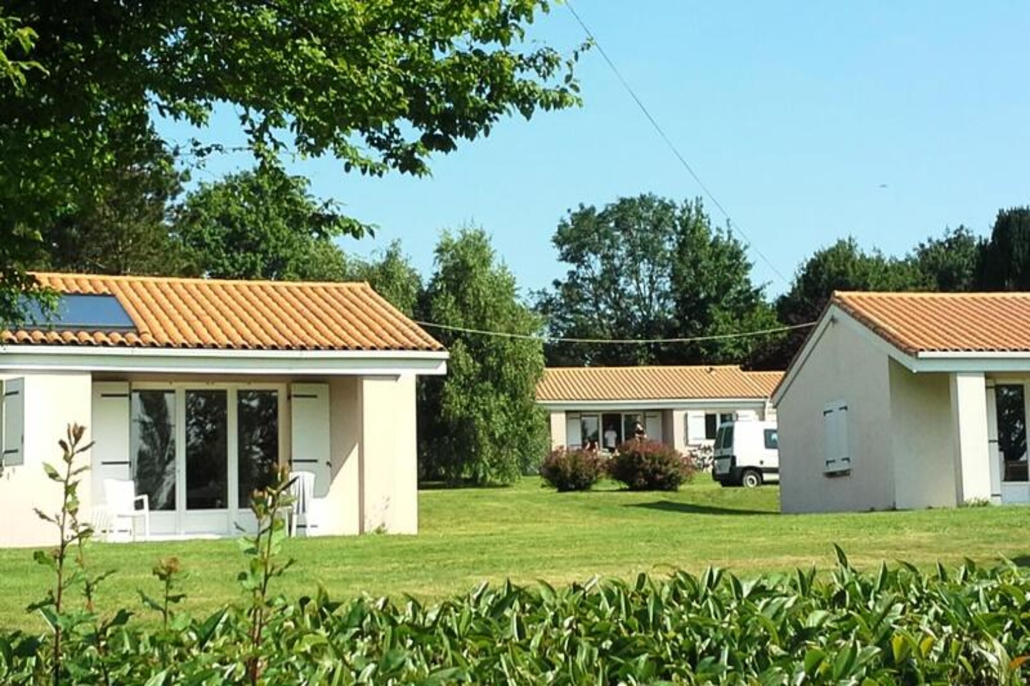 In a resolutely bucolic atmosphere, the Domaine du Lambon invites you to stays in nature. In a fully equipped single-storey house or mobile home, or on one of the 44 campsites, enjoy with family or friends, recharge your batteries in a green setting nestled in the heart of the Melloise countryside, just 1 time of Futuroscope in Poitiers.



To go green for a day or a stay, just a stone's throw from your home, come and enjoy outdoor activities at the Lambon Leisure Center, at the edge of a tree-lined lake. of 15 hectares.



There is something for everyone: ideally located on the edge of the Lambon lake, the leisure center will allow you to discover new sensations in an exceptional natural environment thanks to water activities and climbing activities. For the less adventurous and for more relaxation, you can enjoy other leisure activities or sunbathe on the beach. You choose!



The Lambon estate is 15 hectares, around a body of water, dedicated to relaxation in the great outdoors, water sports, climbing, and leisure activities. Mountain bike rides, treetop courses, inflatable structures for children, canoeing, paddle or pedal boats on the lake, archery, fitness trails and fishing.
3-room mobile home for 4/5 people with covered terrace:



Living room with single convertible sofa.

Equipped kitchen.

Bedroom with double bed and bedroom with 2 single beds.

Shower room and WC.
Wifi access - free at reception
Pets allowed - dogs and cats allowed: 10&euro; per animal/day and 45&euro; per animal/week (1 per accommodation)
Deposit (additional) - 300
Final cleaning package - 60&euro; (House), 45&euro; (Mobile Home)
Baby Kit - loan of baby equipment (bed, chair, bath) on request and depending on availability
Bed linen - extra: 11&euro; / bed / change - included for stays of 1 to 6 nights
Bathroom linen - extra: 10&euro; / person / change - included for stays of 1 to 6 nights
Parking - free private
Breakfast - 11&euro; per person/day and 8&euro; per child/day (-10 years old)
Heated swimming pool - outdoor heated with free access: open from February to September
Tourist tax (additional charge) - to be paid on site according to the current rate
Television - free in accommodation
