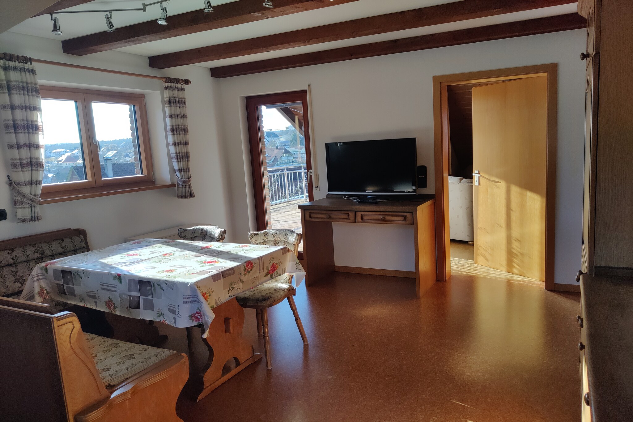 On the 1st floor: (open kitchen(toaster, cooker(4 ring stoves, ceramic, electric), coffee machine(filter), oven, microwave, dishwasher, fridge), Living/diningroom(TV(satellite), dining table), bedroom(single bed, double bed), bedroom(double bed), bathroom(bath tub, shower, 2x washbasin), toilet)\n\nbalcony, heating(electric, central), garden(shared with the owner , 300 m2), garden furniture, parking, deckchairs, play equipment, Sheets incl.