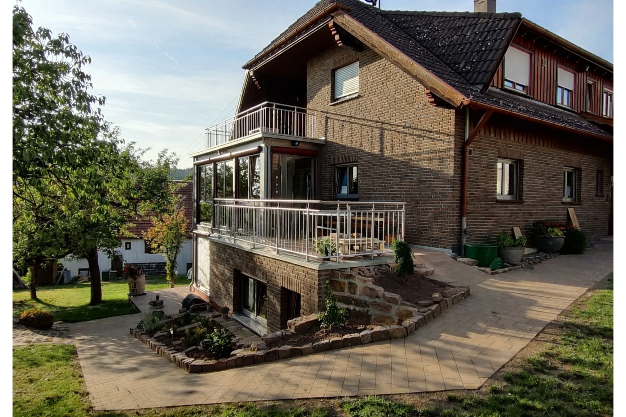 Nestled in a quiet residential area near Neuweiler, this tastefully furnished two-room apartment offers a cozy retreat for up to four guests. Located on the first floor, it features a balcony with picturesque views, a shared, fenced garden, central heating, and lounge chairs for relaxation. The open-plan kitchen, comfortable bedrooms, and inviting living room make the apartment ideal for small families seeking comfort and a connection with nature.

Two e-bikes (mountain bikes) are available for rent from the landlord, and guided e-bike tours can be arranged for a fee.

Included highlights:

All utilities included
Bed linens
Wi-Fi

The surrounding Black Forest region is a paradise for outdoor enthusiasts – tennis, winter sports, hiking, cycling, swimming, and peaceful forest walks are all within easy reach. Shops, cafes, and restaurants complete your stay. Popular day trips include the Northern Black Forest National Park, the Bad Teisnach thermal baths, Bad Wildbach, and adventure attractions such as the high ropes course and the treetop walkway.

Parking is available, and the nearest train station is 10 km away. The apartment is reserved exclusively for recreational stays.