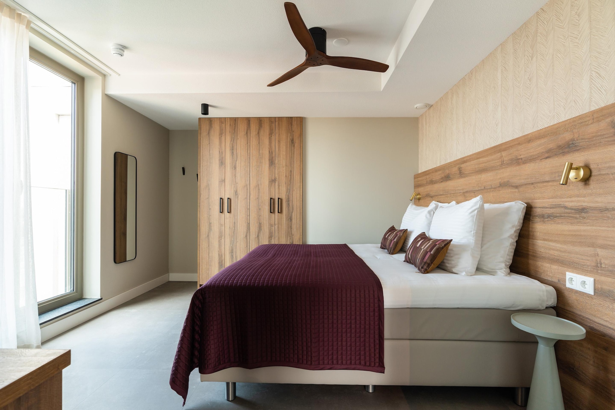 Ground floor: (Living room(TV(smart TV), seating area, chromecast), open kitchen(hob, hood, coffee machine, combination microwave, dishwasher, fridge-freezer, dishes and cutlery, Cooking basics), pantry(washing machine), bedroom(double bed box, TV(smart TV), chromecast), bedroom(single box bed), bathroom(shower(walk-in shower), washbasin, toilet), Internet access)\n\ntumble dryer, washing machine, balcony, heating, air conditioning, parking, fitness equipment, hairdryer