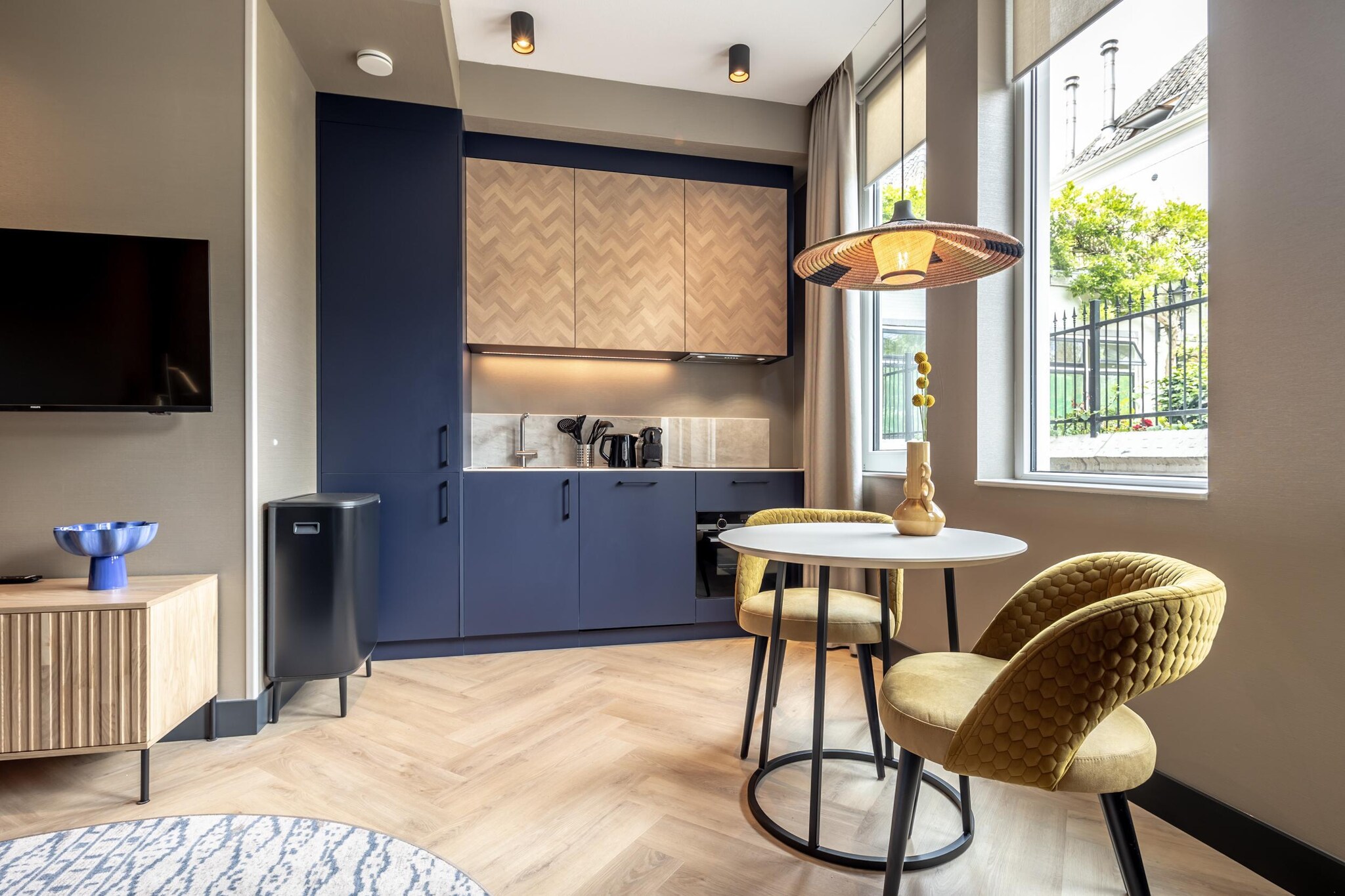 Ground floor: (open kitchen(hob, hood, coffee machine, combination microwave, dishwasher, fridge-freezer, dishes and cutlery, Cooking basics), pantry(washing machine), Living/bed room(double bed box, TV(smart TV), seating area, chromecast), bathroom(shower(walk-in shower), washbasin, toilet), Internet access)\n\ngarage, tumble dryer, washing machine, heating, air conditioning, fitness equipment, lift, ironing board, iron, hairdryer