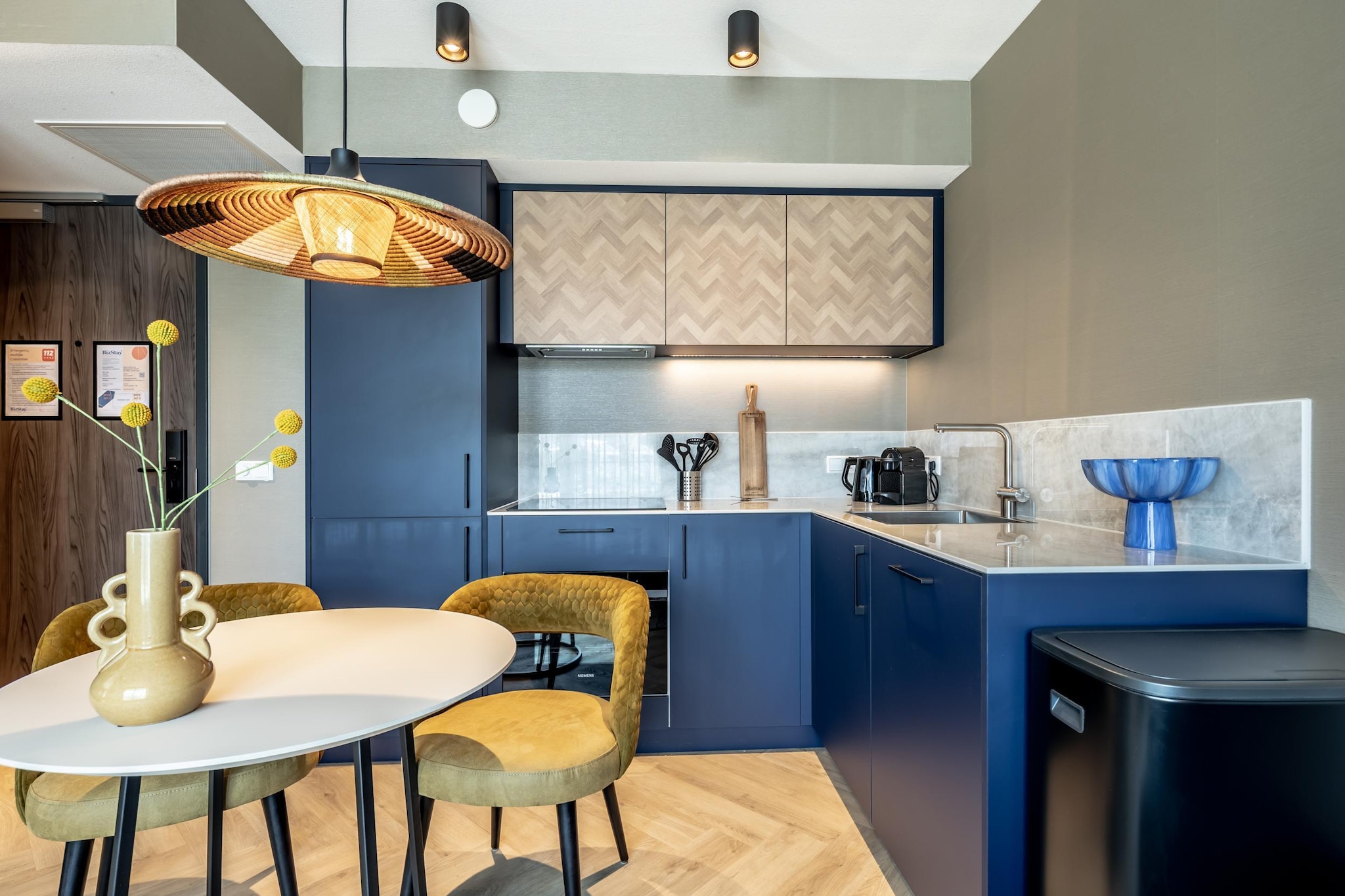 Ground floor: (open kitchen(hob, hood, coffee machine, combination microwave, dishwasher, fridge-freezer, dishes and cutlery, Cooking basics), pantry(washing machine), Living/bed room(double bed box, TV(smart TV), seating area, chromecast), bathroom(shower(walk-in shower), washbasin, toilet), Internet access)\n\ntumble dryer, washing machine, heating, air conditioning, parking, fitness equipment, ironing board, iron, hairdryer