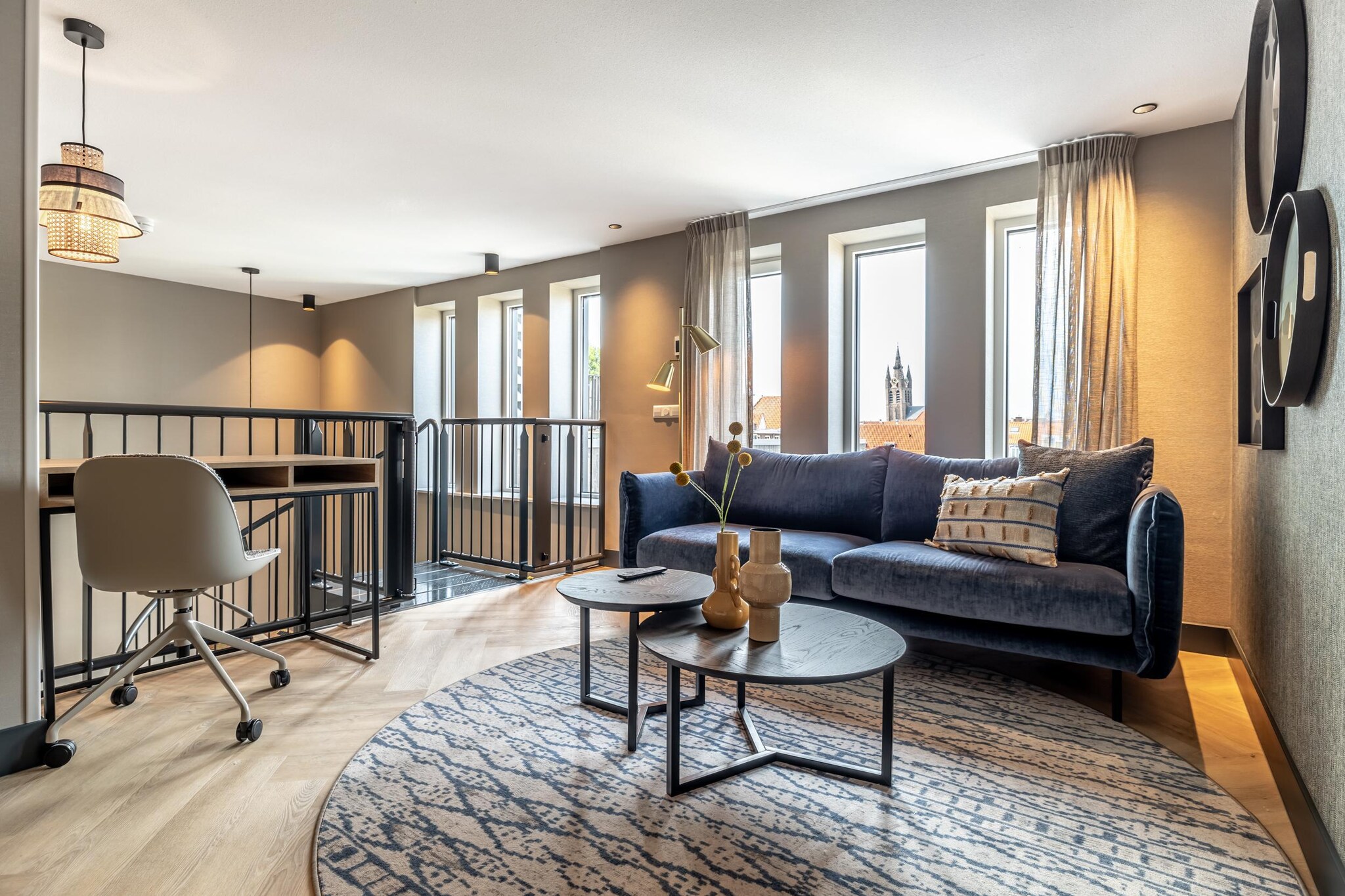 Stylish City Escape with Historic Views
Step into comfort and charm at this beautifully designed 1-bedroom split-level apartment in the heart of Delft. Featuring a modern open-plan kitchen and cozy dining area, the space is thoughtfully outfitted with high-end amenities, including a washer/dryer, SMART TVs with Chromecast, and a luxurious ensuite bathroom. A spiral staircase leads to the bright upper-level lounge, where you’ll be greeted by postcard-worthy views of Delft’s iconic churches. Whether you’re in town for a short stay or an extended visit, this apartment promises both relaxation and functionality in equal measure.
Prime Location in Delft’s Iconic Canal District
Situated on one of the most picturesque canals in Delft, your stay places you just a 6-minute walk from the central station with direct connections to The Hague, Rotterdam, and beyond. Enjoy access to a serene communal garden, a fitness center, and co-working spaces with coffee facilities—all within the historic core. The TU Tech Campus, Royal Delft, and the Nieuwe Kerk are all within walking distance. Plus, with Rotterdam The Hague Airport only 20 minutes away, your travels couldn’t be more seamless.
Dine, Discover & Relax
From Michelin-rated restaurants to cozy canal-side cafés, you’ll be surrounded by top-tier dining and vibrant nightlife, all within a kilometer. Enjoy a stroll to Albert Heijn for groceries just 140 meters away, or explore museums, shops, and scenic bike routes. Please note: this is a smoke-free, pet-free property—ideal for guests seeking a quiet, allergy-friendly retreat.
