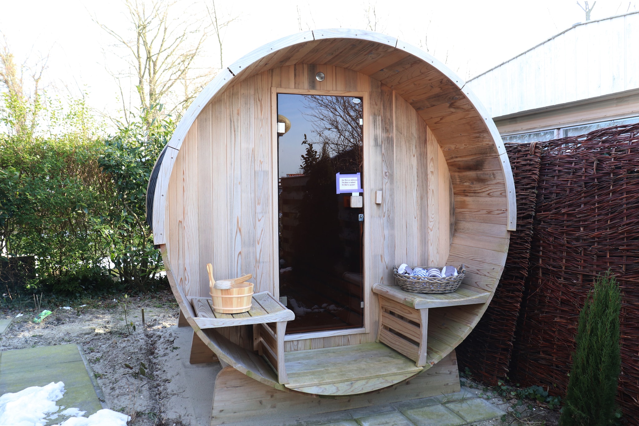 This cozy holiday home in Eanjum, Friesland is a peaceful retreat for families or small groups. With two comfortable bedrooms, a spacious living area, and a fully equipped kitchen featuring an oven, microwave, espresso machine, and dishwasher, it sleeps up to four guests. Large garden doors open to a private terrace, blending indoor comfort with outdoor serenity. Free Wi-Fi and a sauna add to the relaxing atmosphere.
The home includes plush sun loungers, a parasol-shaded terrace, and a spacious garden surrounded by greenery. A garden shed and private parking offer added convenience, while the sauna provides a touch of wellness. Whether you're enjoying a quiet morning coffee or dining al fresco, the layout is designed for comfort and ease.
Nearby, explore the bird-rich Nationaal Park Lauwersmeer just 2 km away, or hike the tidal flats of the Wadden Sea, a UNESCO World Heritage site. Visit Zeehondencentrum Pieterburen to learn about seal rescue, or play a round at Pitch & Putt Esonstad. For dining, enjoy regional dishes at Het Raadsel van de Wadden, or head to Dokkum (17 km) for charming cafés like Stadscafé Pizzeria Uccello and Artisante2. With nature, culture, and cuisine all close by, this home is a perfect base for your Frisian escape.