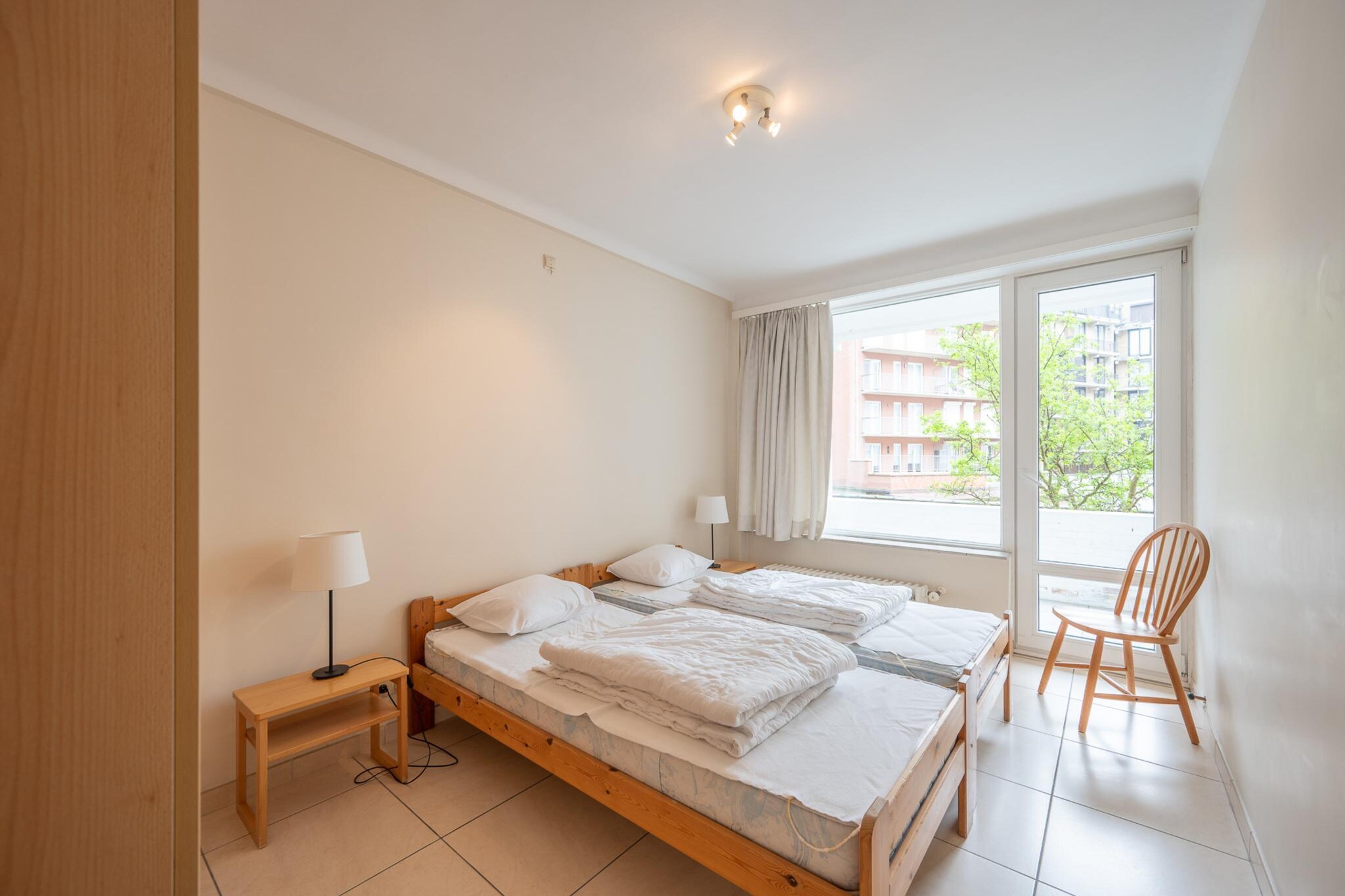 This spacious and comfortable apartment, on the 1st floor of Residence Cumberland House on the Zeedijk, provides the ideal hub for your seaside holiday. Strategically placed between the Knokke Casino and Rubensplein, the apartment is within walking distance of lively beach bars and the lively center of Knokke-Heist.

Visit the nearby beach bars or walk along the center of Knokke-Heist, which boasts a range of shops, cafes, and restaurants. For nature enthusiasts, there is the Zwin Nature Park close by, and for those who like to have a bit of evening entertainment, the Knokke Casino provides excitement. With its convenient location and all the amenities of modern living, this apartment is the ideal base for your sea-side holiday!

The flat has a big, light living room with an open kitchen and stunning frontal sea views. The closed hall has a storage room with washing machine and dryer, and in addition, there is a separate toilet. With three bedrooms two with two single beds, one with a bunk bed it welcomes families or small groups. There are two large bedrooms leading out to a large sun terrace at the back, ideal for taking in the fresh air and unwinding. There's a fully functional kitchen with a dishwasher, microwave, coffee maker, and all the rest to make cooking meals a breeze. A bathroom and a second shower room offer excellent facilities for your use.

Kindly note that the booking is subject to the hostâ€™s approval. The host will reach out to you shortly to confirm the details.