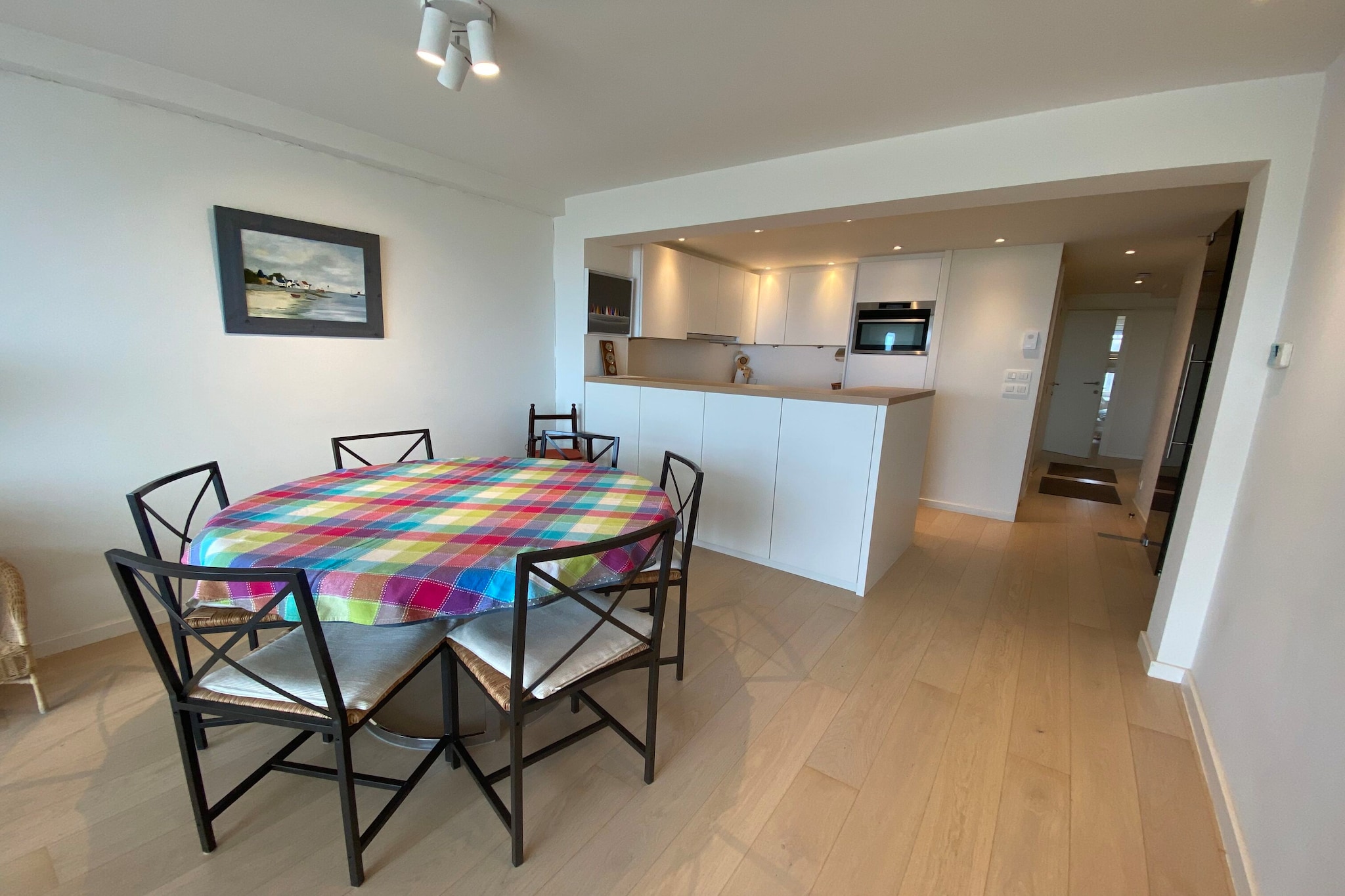 Perched on the 9th floor in Knokke-Heist, this modern apartment welcomes up to six guests in comfort. The fully equipped open kitchen includes a ceramic hob, pad coffee machine, combination microwave, juicer, mixer, toaster, and dishwasher, making it easy to prepare meals at home. The bright living/dining room features a digital TV, dining table, and a cozy seating area, perfect for relaxing after a day by the sea.

The apartment offers a flexible sleeping layout with two bunk-bed rooms and one en-suite bedroom featuring two single beds (90 x 200 cm), a private shower, washbasin, and toilet. An additional bathroom with a shower and washbasin ensures convenience for all guests. A washing machine, ironing board, and iron are provided, along with a high chair for families with children.

Guests can enjoy fresh air and coastal views from the private patio and terrace. Bicycle storage is available for those wanting to explore the area on two wheels. With free WiFi throughout and just 20 km from Brugge, this apartment makes a perfect base for a seaside holiday in West Flanders.