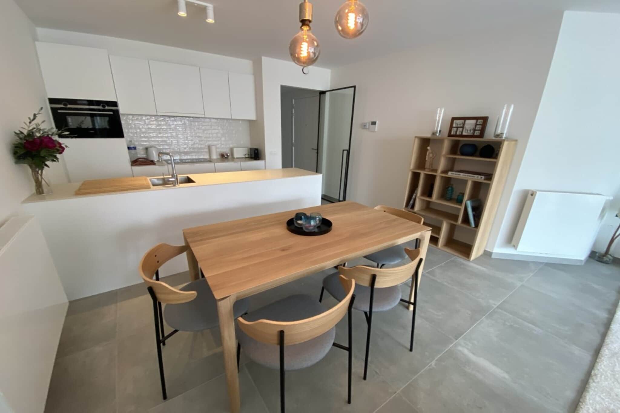 Located in Knokke-Heist, this modern first-floor apartment comfortably hosts 4 guests. The open-plan kitchen comes fully equipped with an induction hob, combination microwave, dishwasher, and both capsule and filter coffee machines, perfect for home cooking. The adjacent living/dining area includes a digital TV, dining table, and a double sofa bed for extra sleeping space.
The layout includes a bunk bed in a separate bedroom and a master bedroom with a double bed and private ensuite with shower and washbasin. A second bathroom with shower and toilet, plus an additional separate toilet, ensures convenience for all guests.
Outside, enjoy a private patio and terrace, ideal for relaxing or dining al fresco. There’s also bicycle storage and private parking. With free WiFi and just 20 km from Bruges, this bright, well-located apartment is perfect for families or small groups exploring the Belgian coast.