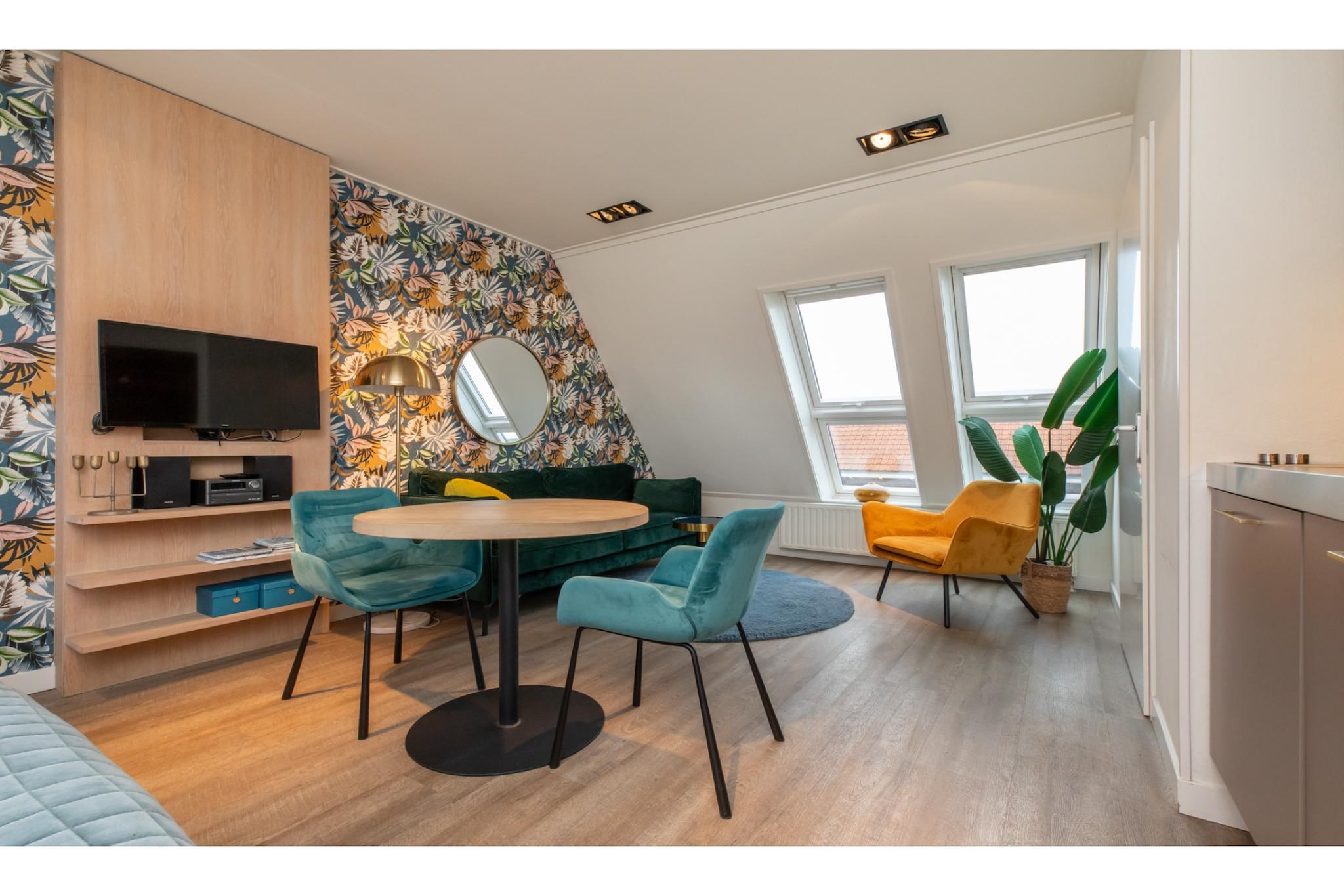 Ground floor: (open kitchen(dining table, stove, electric kettle, coffee machine, espresso machine, microwave, fridge-freezer, dishes and cutlery), Living/bed room(double bed, TV, seating area), bathroom(shower, washbasin, toilet), camping cot, Essentials, heating)