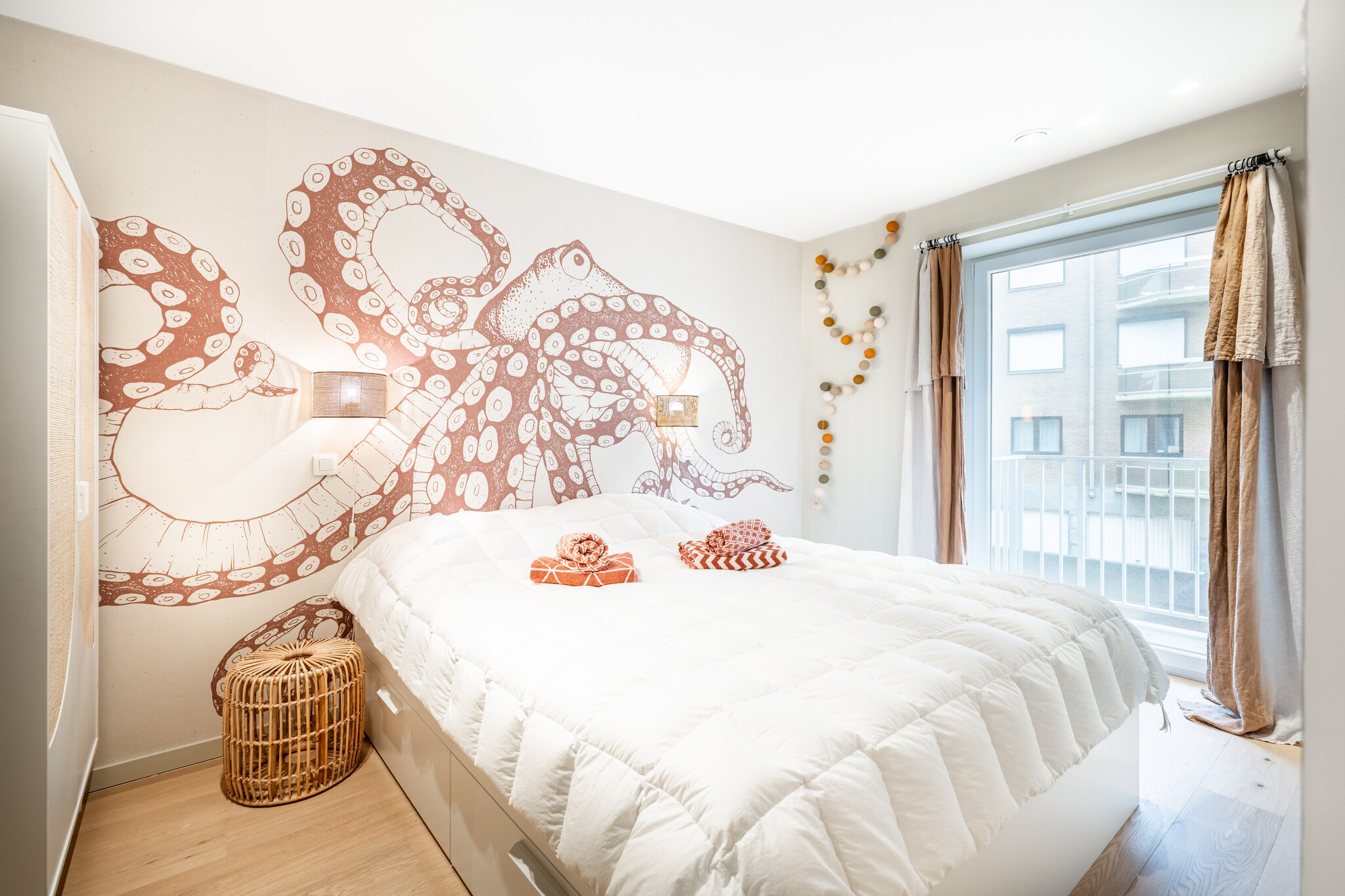 On the 1st floor: (open kitchen(hob(induction), electric kettle, toaster, hood, coffee machine(cups), oven, grill, microwave, dishwasher, fridge-freezer, Juicer, Hand blender), Living/diningroom(TV(flatscreen, digital), dining table, seating area, balcony or terrace), bedroom(double bed(twin duvet, 160 x 200 cm)), bedroom(bunk bed(duvet)), Bedroom with bathroom(double bed(twin duvet, 160 x 200 cm), shower, washbasin, toilet), bathroom(shower(walk-in shower), washbasin, washbasin), toilet(toilet))\n\nbalcony or terrace, lift, ironing board, iron