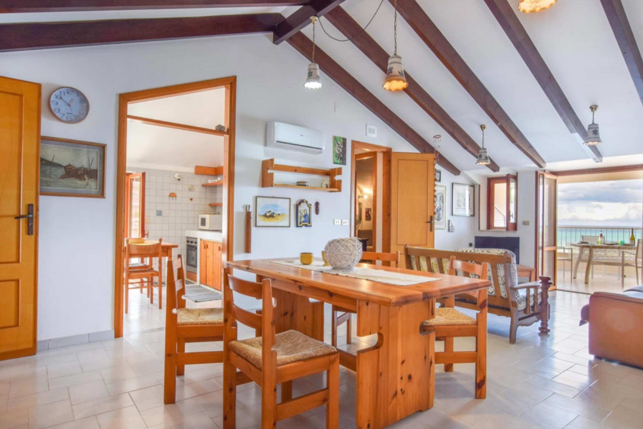 This cozy apartment in Alcamo offers the perfect seaside retreat, located right in front of the beautiful beach in the heart of the Gulf of Castellammare. With three comfortable bedrooms, all equipped with air conditioning, this apartment ensures a restful stay. The living room features a sofa bed, and the fully equipped kitchen provides everything needed for cooking meals in comfort.
The highlight of the apartment is its beautiful balcony with a stunning sea view, ideal for enjoying meals outdoors while taking in the fresh sea breeze. Whether you're unwinding after a day at the beach or enjoying the view, this apartment offers a relaxing and comfortable setting.
Located in a prime area, this apartment is perfect for those who want to enjoy the seaside while exploring western Sicily. Enchanting destinations like San Vito lo Capo, Trapani, Marsala, and Palermo are all within easy reach, making it an ideal base for combining coastal relaxation with the historical and cultural richness of the region.