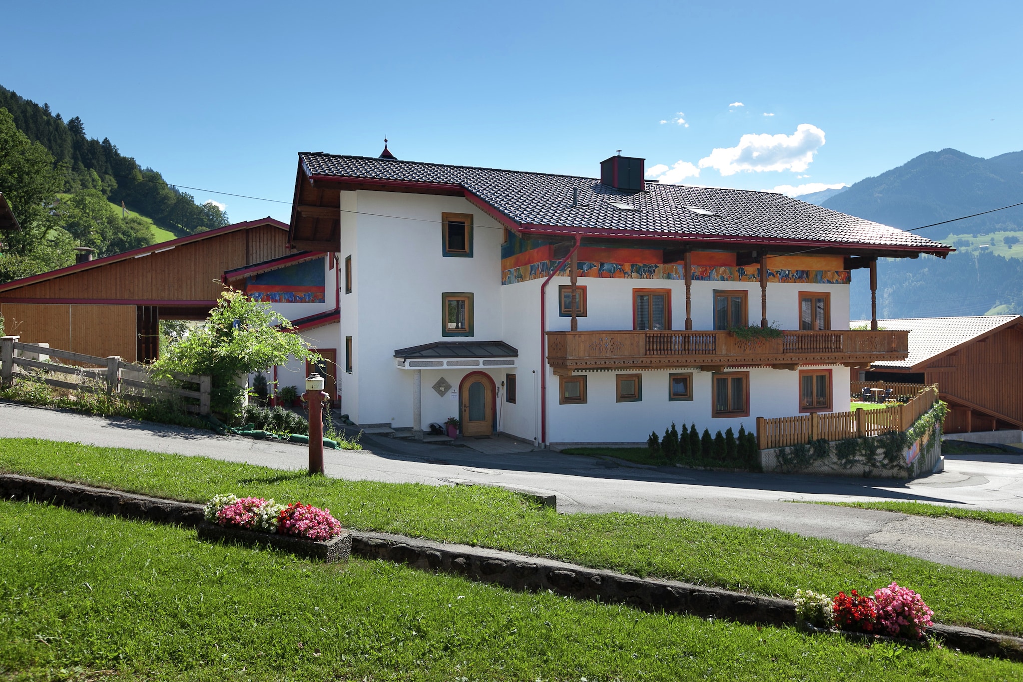 This stylish farmhouse is situated in Hart im Zillertal. Ideal for a small group, it can accommodate a large family with kids or a large group. It has a balcony for you to take a refreshing breath enjoying the scenic view and central heating.
The ski bus is only 100 m and the ski lift 1 km from the farmhouse making it a haven for ski lovers. SKI-Optimal Hochzillertal is nearby. The local grocery store is 2 km away whereas the restaurants are 500 m away from the stay. There is a golf course in Uderns at 4 km.
Central heating and ski storage are provided for you to have a pleasant stay. Carport and parking are in place for your convenience. A children's bed and high chair are also offered to the little guests. There is a charging station for e-cars in the parking lot (wallbox).
Public transport is at 5 km.
You can check-in between 1-6 PM and check-out can be done from 8-10 AM.