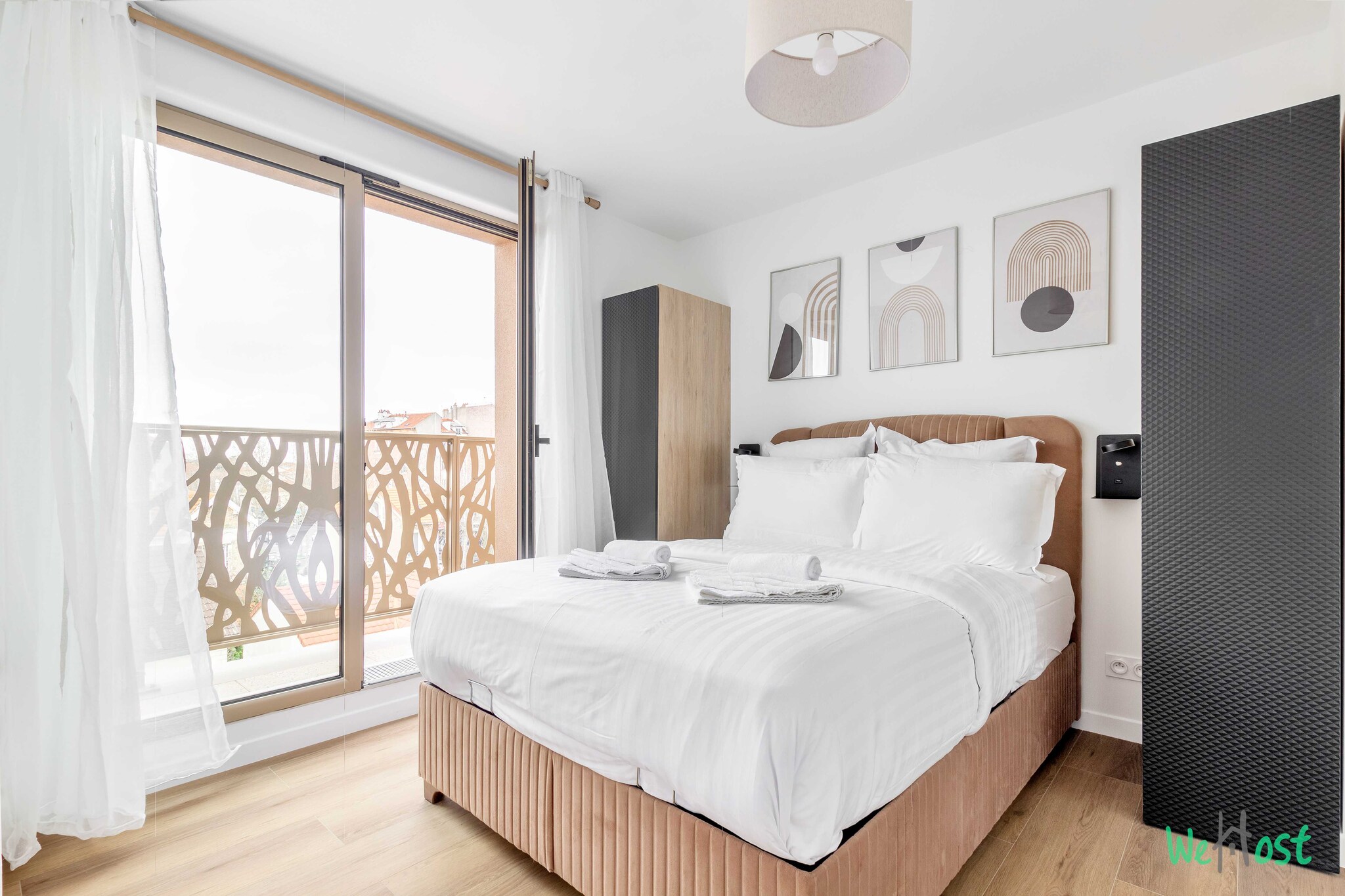 On the 4th floor: (Living room(Bed Linen, Desk, single sofa bed, TV), Kitchen(stove, electric kettle, toaster, coffee machine, microwave, dishwasher, fridge, dishes and cutlery), bedroom(Queen Bed), bedroom(Queen Bed), bathroom(shower, hairdryer, Towels/Sheets (Incl.), shampoo), toilet(toilet))\n\nElevator, Hot Water, Internet Access DSL, Wardrobe, First Aid, Play area, balcony or terrace, heating, air conditioning, iron, Essentials, Dedicated workspace, Cooking basics, Carbon monoxide detector, Cleaning Disinfection, Downtown, Enhanced cleaning practices, Extra pillows and blankets, High touch surfaces disinfected, Long term stays allowed, Room-darkening shades, Town