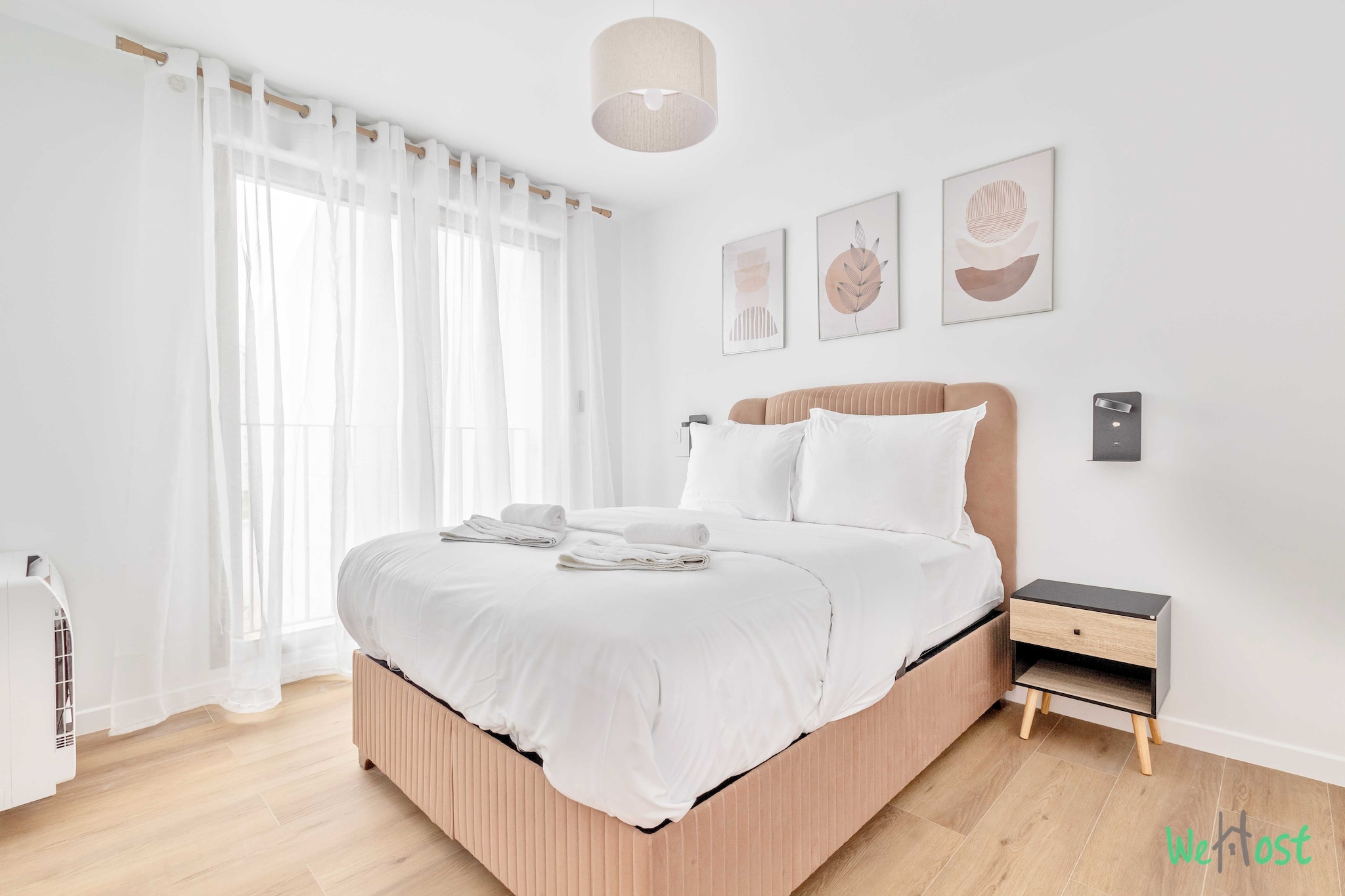 On the 1st floor: (Living room(Bed Linen, Desk, single sofa bed, TV), Kitchen(stove, electric kettle, toaster, coffee machine, microwave, dishwasher, fridge, dishes and cutlery), bedroom(double bed), bedroom(double bed), bathroom(shower, hairdryer, Towels/Sheets (Incl.), shampoo), toilet(toilet))\n\nElevator, Hot Water, Internet Access DSL, Wardrobe, First Aid, Play area, balcony or terrace, heating, air conditioning, iron, Essentials, Cooking basics, Carbon monoxide detector, Cleaning Disinfection, Downtown, Enhanced cleaning practices, Extra pillows and blankets, High touch surfaces disinfected, Long term stays allowed, Room-darkening shades, Town