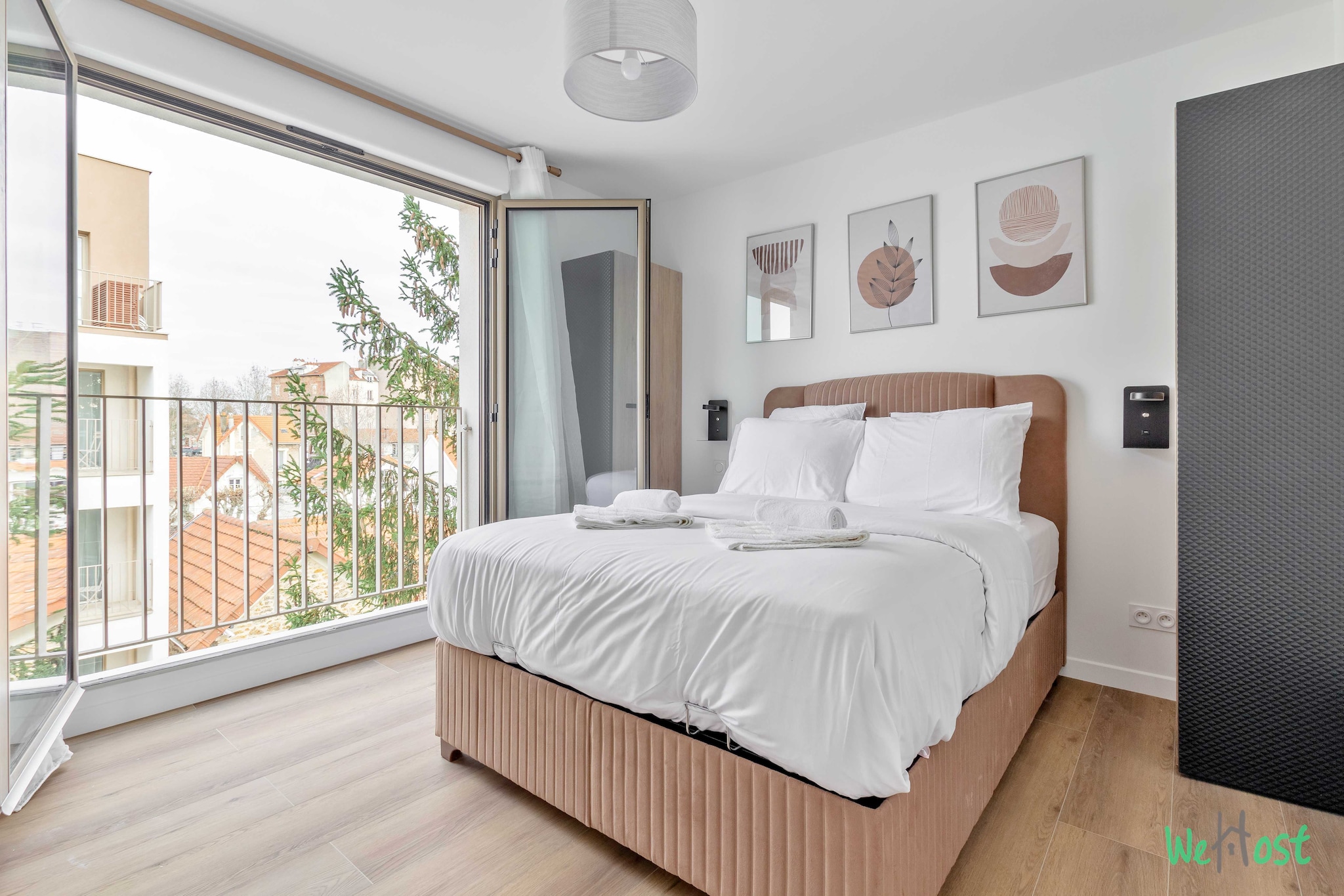 On the 3rd floor: (Living room(Desk, single sofa bed, TV), Kitchen(stove, electric kettle, toaster, coffee machine, microwave, dishwasher, fridge, dishes and cutlery), bedroom(Queen Bed), bedroom(Queen Bed), bathroom(shower, hairdryer, Towels/Sheets (Incl.), shampoo), toilet(toilet))\n\nElevator, Hot Water, Internet Access DSL, Wardrobe, First Aid, Play area, balcony or terrace, heating, air conditioning, iron, Essentials, Dedicated workspace, Cooking basics, Carbon monoxide detector, Cleaning Disinfection, Downtown, Enhanced cleaning practices, Extra pillows and blankets, High touch surfaces disinfected, Long term stays allowed, Room-darkening shades, Town