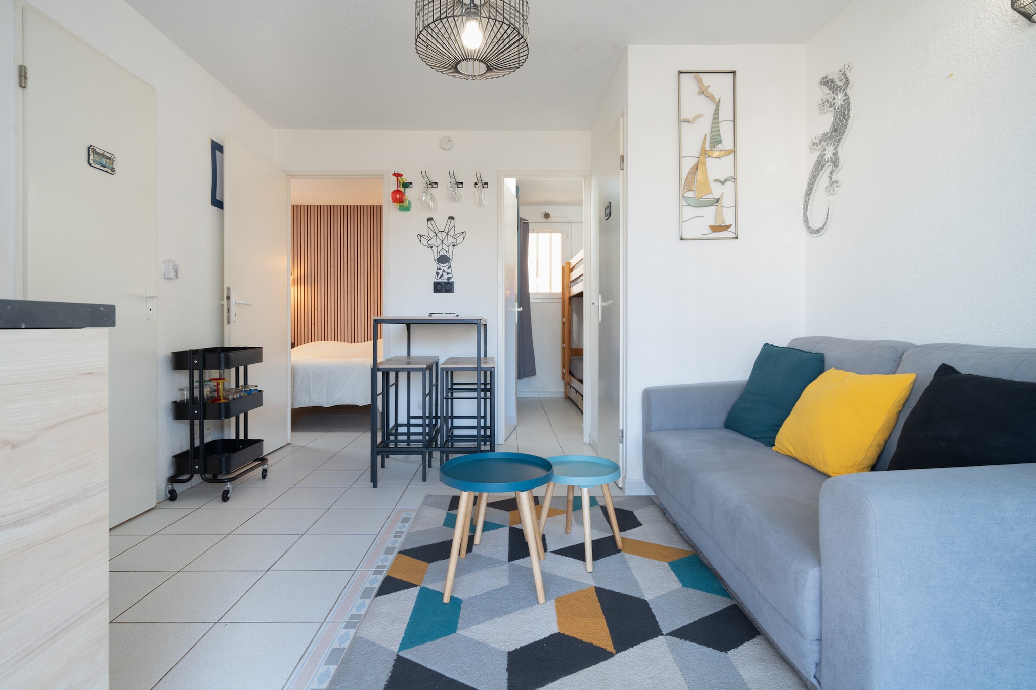Welcome to this charming 27m² apartment in Cap d'Agde, perfect for up to 3 guests. The apartment features a cozy living room with a double sofa bed (140x200) and a large terrace for relaxing outdoors. The well-equipped kitchen includes a refrigerator, freezer, microwave, kettle, toaster, dishwasher, and a Senseo coffee machine, along with all necessary dishes and utensils. For sleeping arrangements, there are bunk beds (90x190) in one room and a double bed (140x200) in the other. The modern bathroom includes a shower and separate WC. The apartment also offers board games and a plancha/bbq for added enjoyment.

Located just 500 meters from the beautiful sandy beaches, this apartment is also conveniently close to the supermarket (500 meters) and shops/restaurants (800 meters). With private, free parking (space #113), you won’t have to worry about finding a spot. Additional services, including bed linen, towels, and end-of-stay cleaning, are available for an extra fee. A deposit of €500 is required upon arrival (bank imprint only).

Cap d'Agde offers a perfect mix of relaxation and adventure. Visit the Bagnas Nature Reserve, a Natura 2000 site, or take a walk through the picturesque landscapes between the ponds, Canal du Midi, and the sea. For fun and thrills, head to Luna Park, an amusement park that delights both young and old. Don’t miss the stunning volcanic cliffs and the Mediterranean dishes served at our favorite restaurant, La Guinguette du Cap. This destination promises an unforgettable experience!