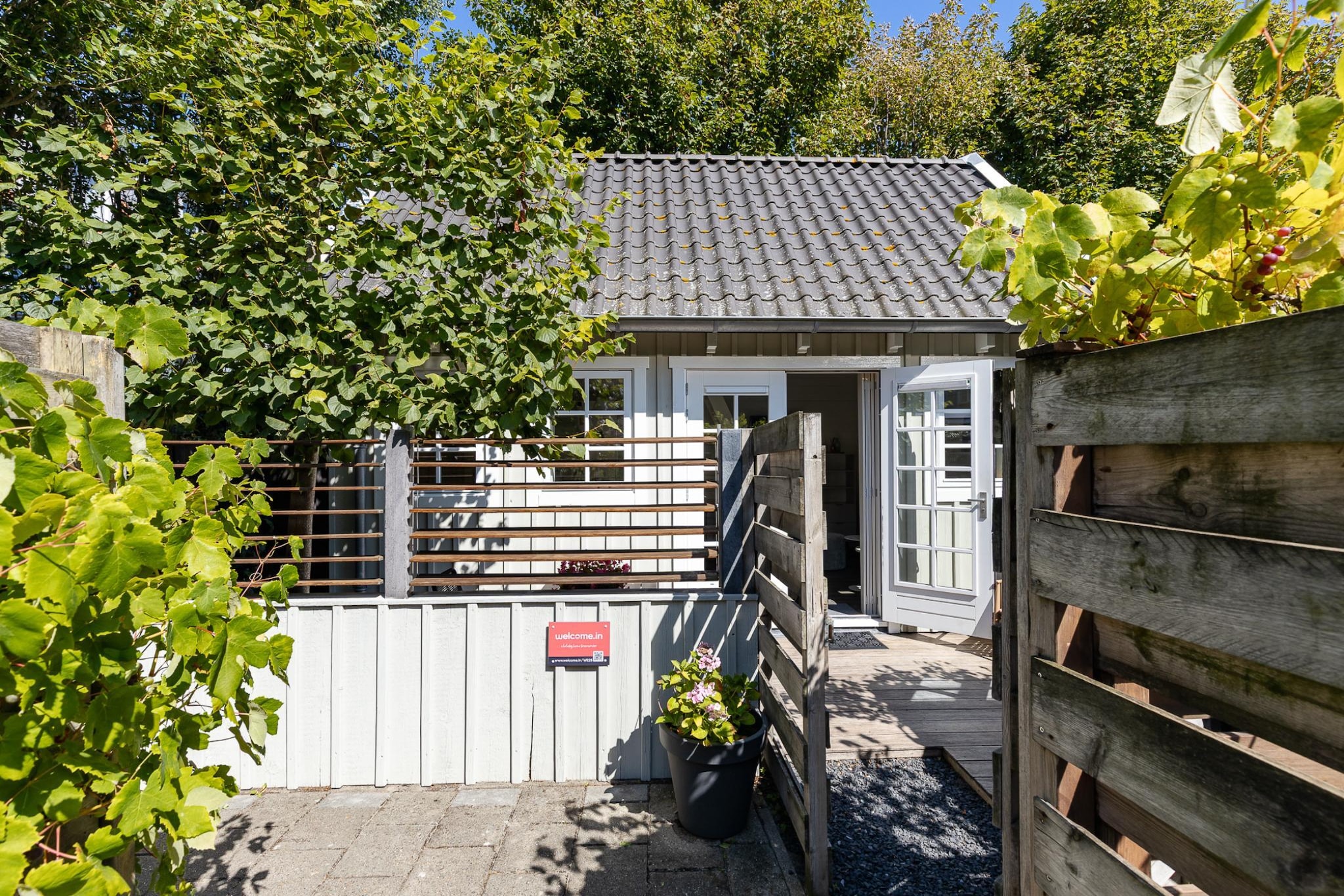 Lijsterhofstraat 13 - Knusse vakantiewoning nabij strand en centrum-Außenbereich Sommer