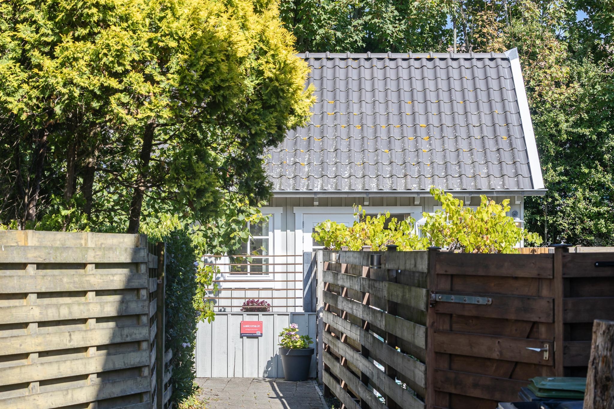 Lijsterhofstraat 13 - Knusse vakantiewoning nabij strand en centrum-Außenbereich Sommer
