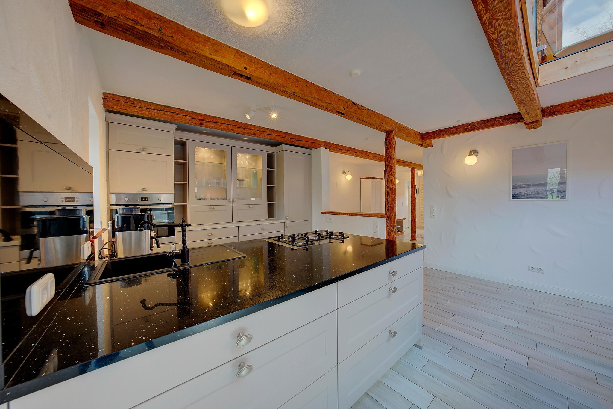 Ground floor: (open kitchen(dining table(6 persons), electric kettle, toaster, cooker(4 ring stoves, gas), coffee machine, microwave, dishwasher, fridge(+ freezer)), bedroom(double bed), bedroom(double bed), bathroom(shower(walk-in shower), washbasin, toilet), bathroom(bath tub, washbasin, toilet), bathroom(shower(walk-in shower), washbasin, toilet, washing machine), Landing)\n\nOn the 1st floor: (Living room(double sofa bed, TV))\n\nheating, terrace, garden, garden furniture, BBQ(gas), parking, parking, high chair, baby crib(free), Towels/Sheets (extra fee)