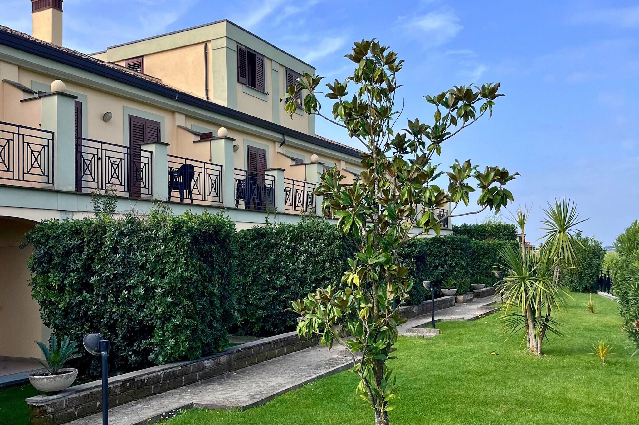 Quadrilocale vista giardino 217-Buitenkant zomer