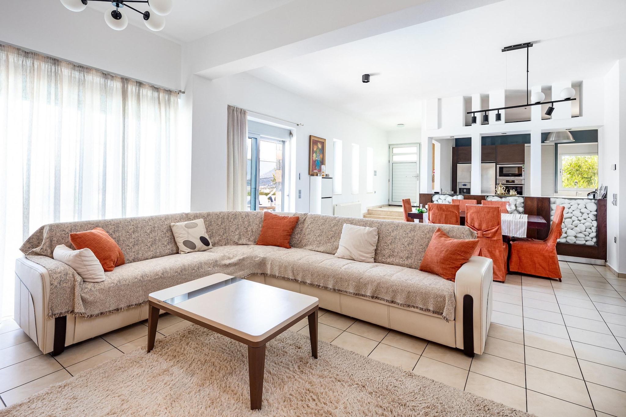 Spacious Stay for Groups
Located in the scenic area of Agios Nikolaos, Crete, Villa Friends is a spacious five-bedroom retreat perfect for large families or a group of friends. With three bathrooms, a modern kitchen equipped with essentials like a dishwasher and oven, and a comfortable living area with Smart TV and air conditioning, it offers all the conveniences of home. Fast Wi-Fi and private parking are also available for a stress-free stay.

Relax in Nature with Views
The villa’s standout feature is its private swimming pool, set against a backdrop of lush gardens and rugged mountain views. Whether you’re sunbathing poolside or enjoying dinner at the outdoor dining area with built-in BBQ, the space is designed for relaxation and socializing. The surrounding terrace invites you to unwind with your loved ones in peaceful surroundings.

Discover Crete’s Coastline
From fishing and snorkeling to bike rentals, Agios Nikolaos offers plenty of outdoor fun just a short drive from the villa. Whether you're exploring nearby beaches or simply enjoying the serene views, Villa Friends makes an excellent base for a memorable holiday in Crete.