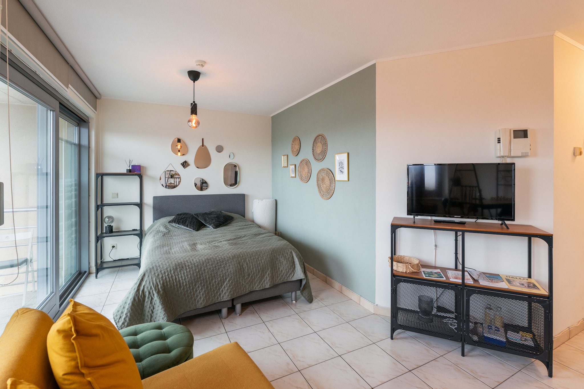 This cozy studio offers a relaxing retreat on the Belgian coast, ideally located on the Zeedijk in Blankenberge. Designed for up to three guests, it features a comfortable sleeping area with a cozy double bed and a sofa bed for an additional guest. The inviting living space is perfect for unwinding, while the private terrace provides a peaceful spot to enjoy the sea breeze. Small pets are welcome, allowing you to bring your furry friend along for the getaway.  

Perfectly situated near the beach, the studio is an excellent base for coastal adventures. Blankenbergeâ€™s sandy shores are ideal for sunbathing, swimming, or enjoying a scenic walk along the promenade. The nearby Blankenberge Pier and Sea Life Aquarium offer fun for all ages, while the vibrant town center boasts a variety of restaurants, cafes, and shops. Local markets provide fresh ingredients for home-cooked meals, making it easy to experience the regionâ€™s culinary delights.  

Equipped with modern amenities, the studio ensures a convenient and comfortable stay. Free Wi-Fi, a Smart TV with digital channels, and a high dining table add to the cozy atmosphere. The open kitchen includes a Dolce Gusto coffee machine, microwave, oven, and refrigerator for easy meal preparation. An elevator provides easy access to the unit, completing this well-appointed coastal retreat.