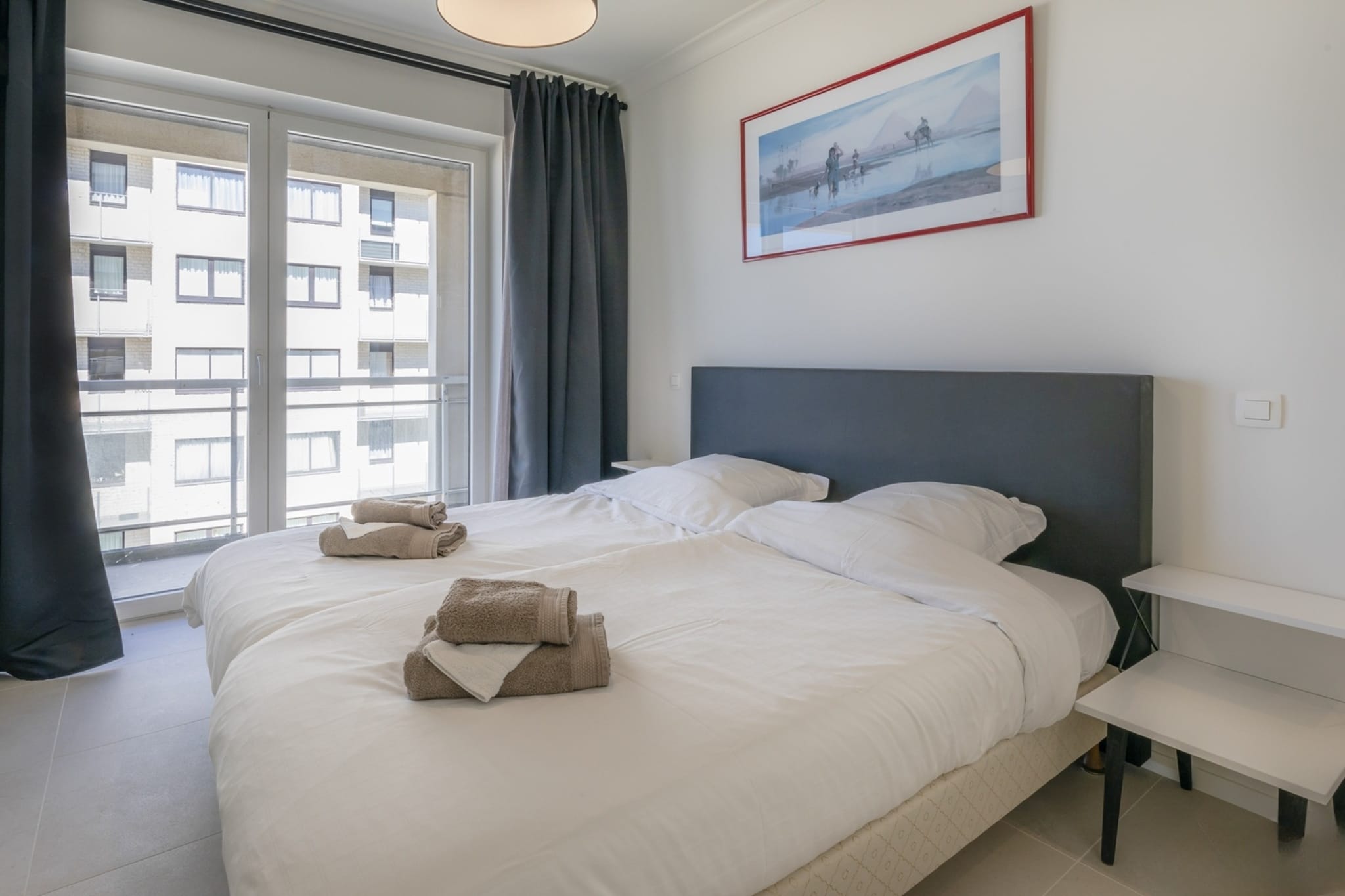 On the 6th floor: (Living room(single sofa bed, single sofa bed, TV(flatscreen, digital), dining table(8 persons), seating area), open kitchen(stove, hob, toaster, coffee machine, oven, microwave, dishwasher, fridge-freezer, dishes and cutlery), bedroom(Queen Bed), bedroom(Queen Bed), bedroom(Queen Bed), bedroom(double bed), bedroom(bunk bed, bunk bed), bathroom(bath tub, shower, toilet), bathroom(bath tub, shower, toilet), bathroom(bath tub, shower, toilet), storage, Internet access)\n\ngarage, tumble dryer, sauna, private infrared cabin, washing machine, heating, terrace, garden furniture, Sea view