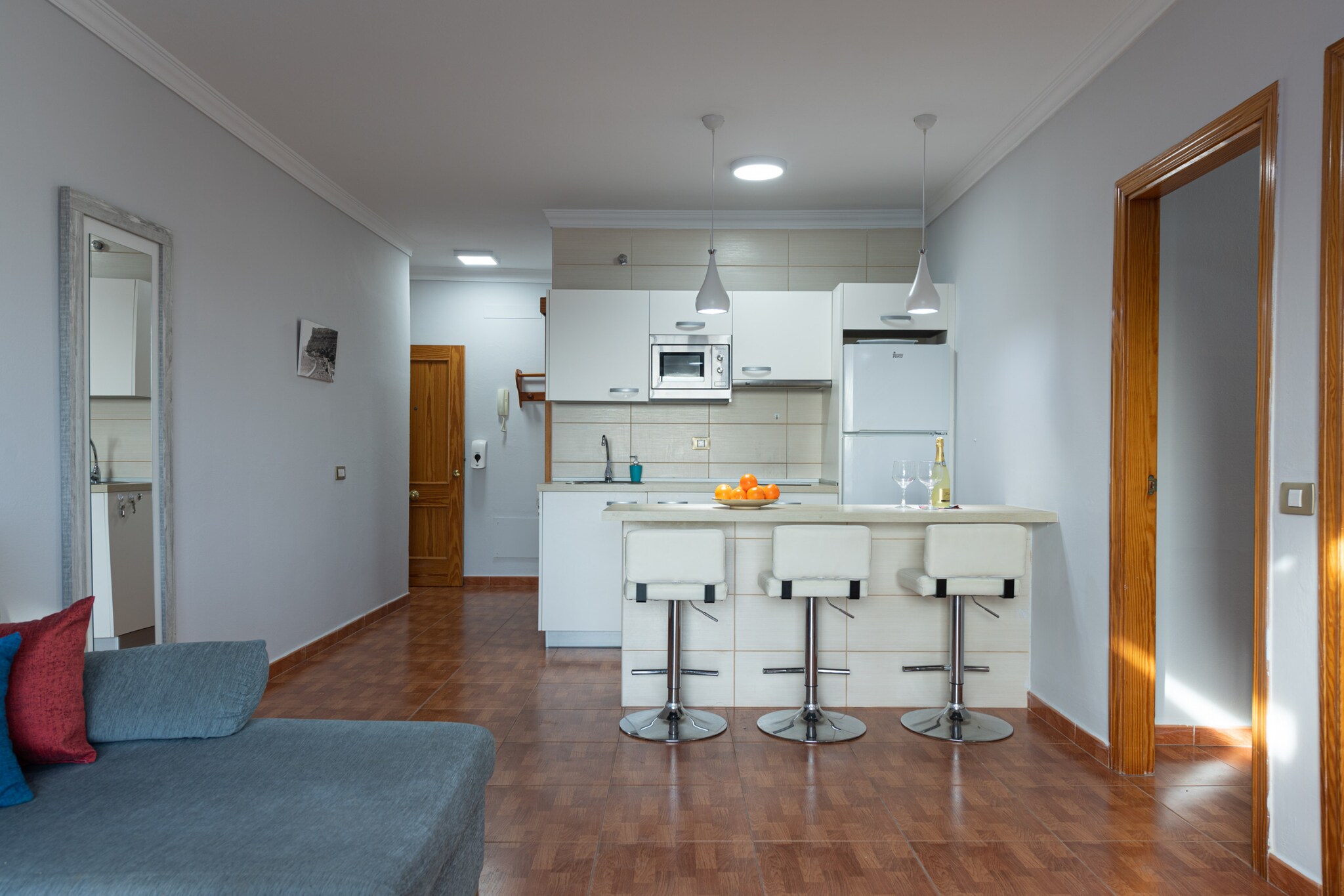 On the 1st floor: (Kitchen(electric kettle, toaster, coffee machine, microwave, dishwasher, fridge, freezer, dishes and cutlery), Living/diningroom(TV, dining table, seating area), bedroom(double bed), bedroom(single bed, single bed), bathroom(shower), Internet access)\n\ncot, washing machine, terrace, garden(fenced), garden furniture, sun loungers, parking, high chair, iron, hairdryer, Mountain view