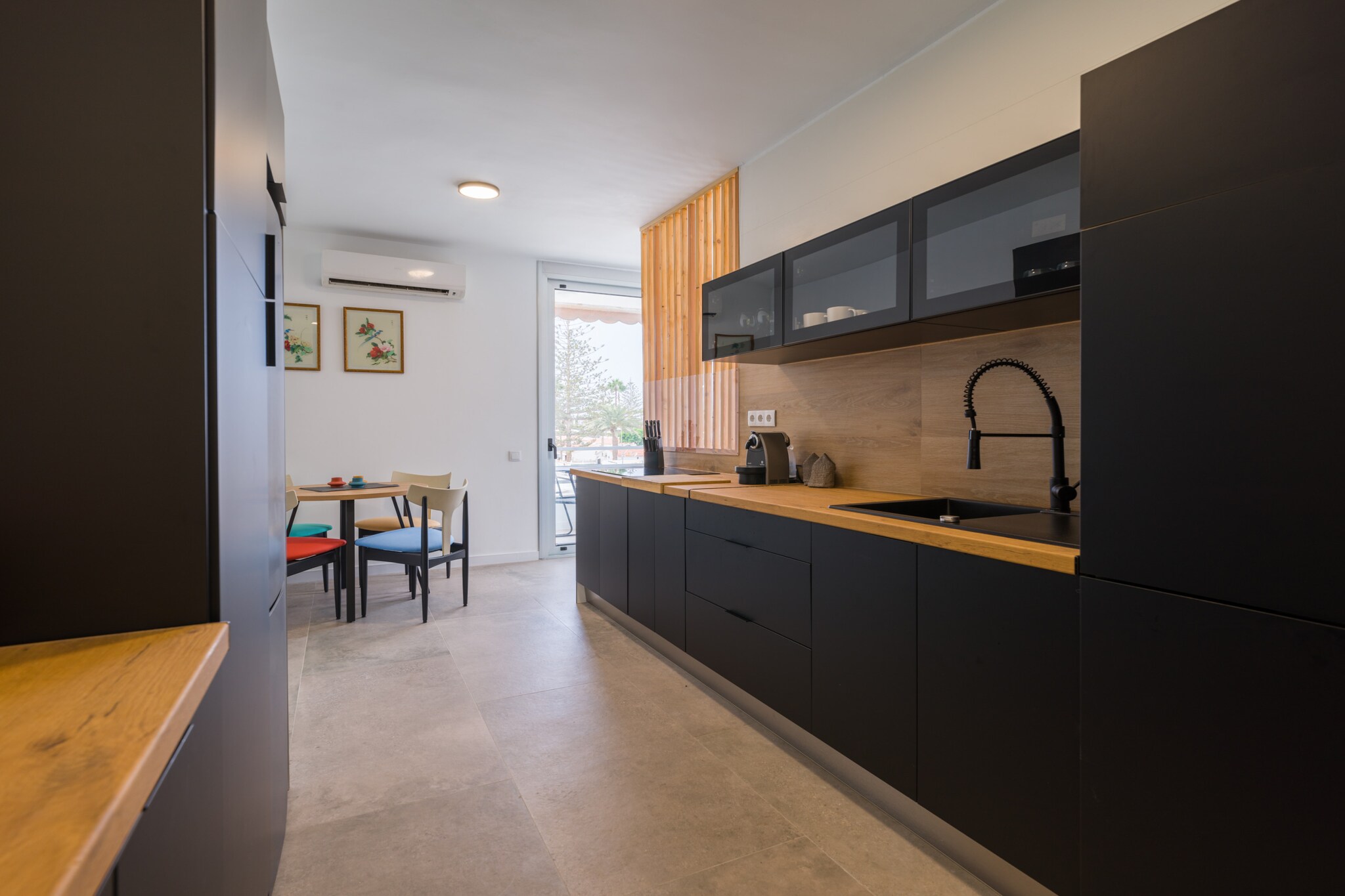 Elevator, Fan, Kitchen(electric kettle, toaster, coffee machine, microwave, dishwasher, fridge, freezer, Juicer, dishes and cutlery), Living/diningroom(TV(satellite), dining table, seating area), bedroom(single bed, single bed), bedroom(double bed), bathroom(shower), Internet access, air conditioning, terrace, sun loungers, parking, swimming pool(shared with other guests), iron, hairdryer