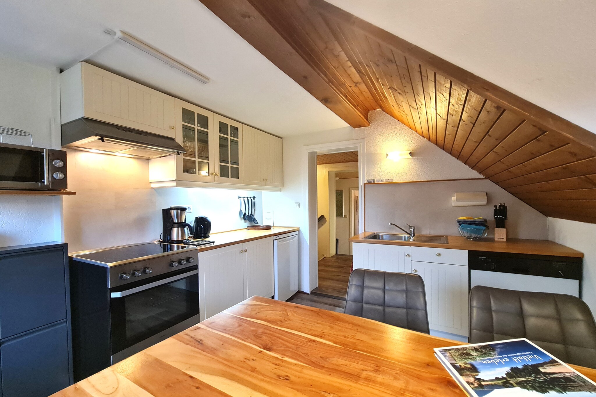 Kitchen(electric kettle, coffee machine, oven, microwave, dishwasher, fridge), bedroom(double bed), bedroom(single bed, single bed), bathroom(shower), Garden Furniture , washing machine, balcony, garden, parking, swimming pool(private), hairdryer, dishes and cutlery