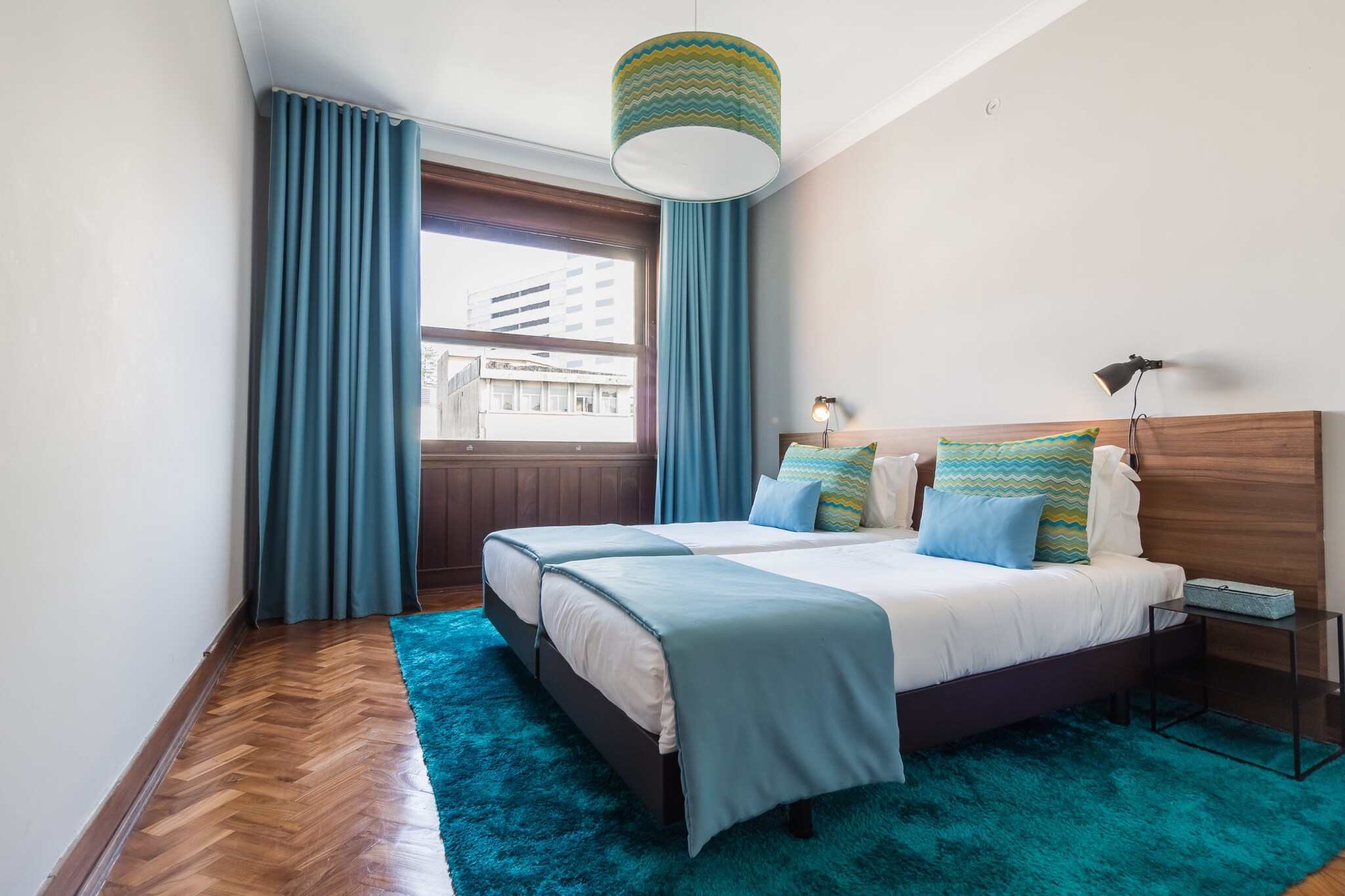 On the 4th floor: (Living room(single sofa bed, TV(satellite), dining table, seating area), open kitchen(electric kettle, toaster, coffee machine, oven, microwave, fridge-freezer, Juicer, dishes and cutlery), bedroom(single bed, single bed), bedroom(double bed), bedroom(single bed, single bed), bathroom(bath tub, shower, hairdryer), Internet access, washing machine, balcony, air conditioning, lift, iron)