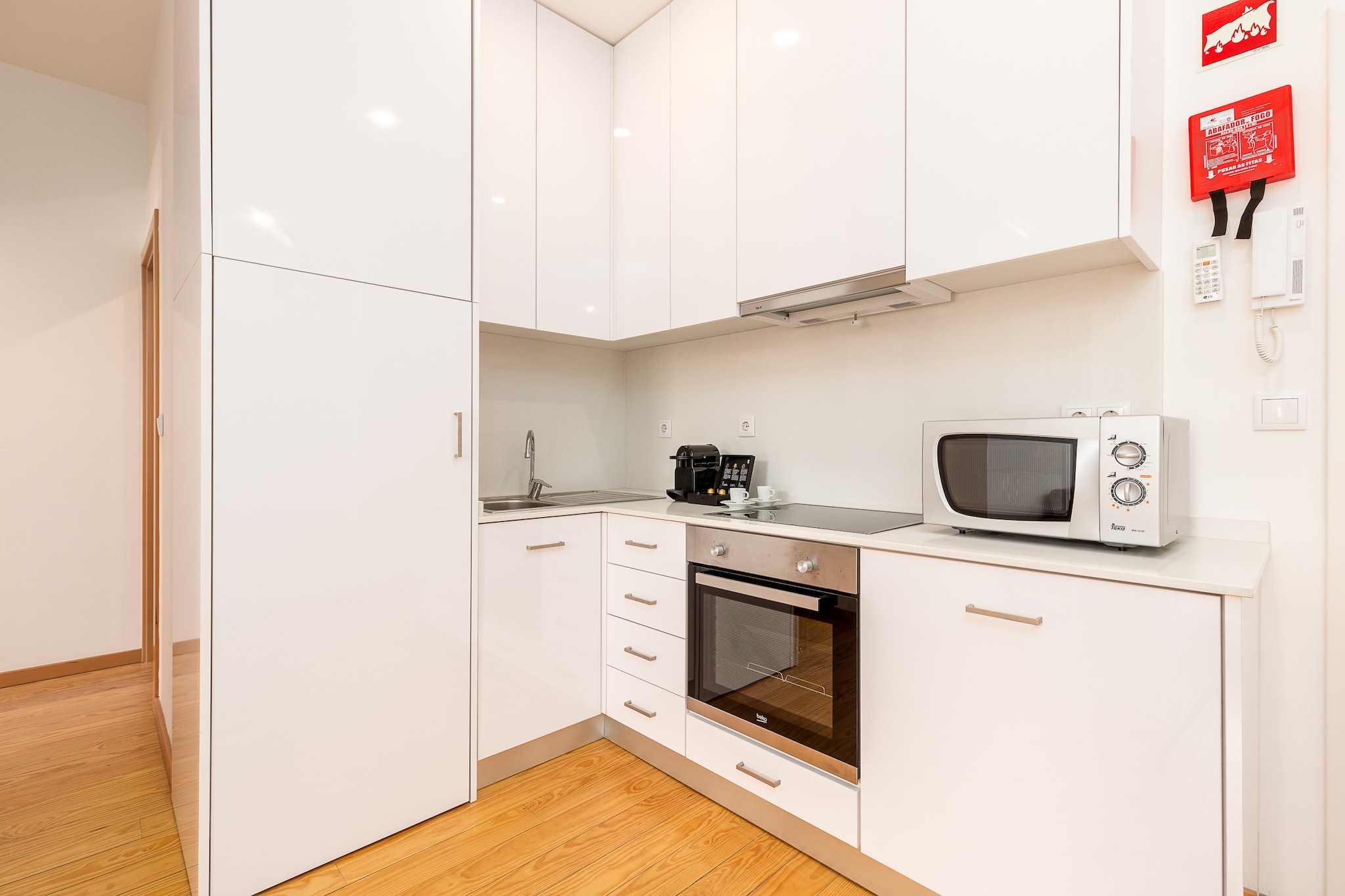 On the 3rd floor: (Living room(TV(satellite), dining table, seating area), open kitchen(electric kettle, toaster, coffee machine, oven, microwave, fridge-freezer, Juicer, dishes and cutlery), bedroom(double bed), bathroom(shower, hairdryer), Internet access)\n\nbalcony, air conditioning, iron