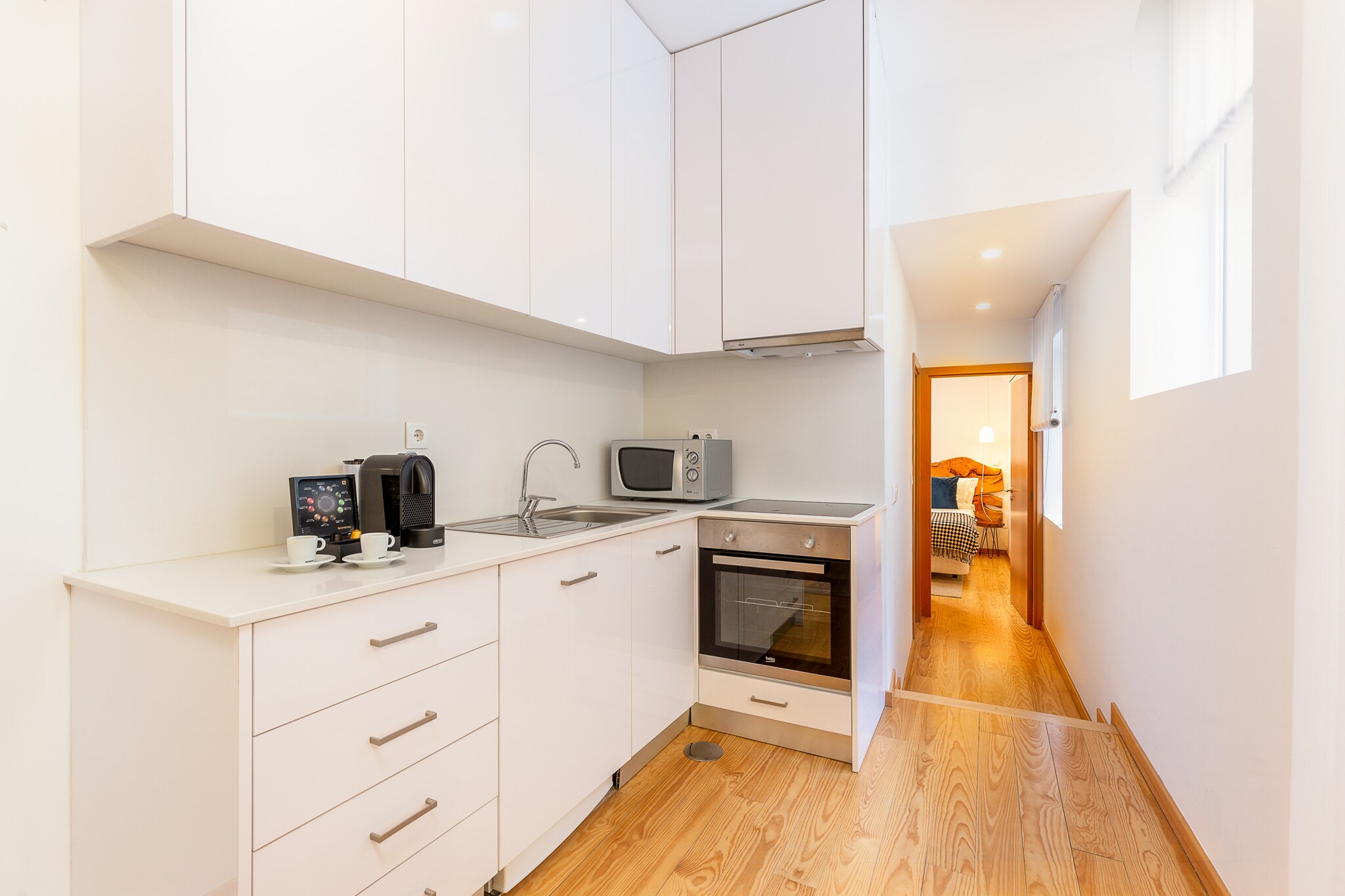 On the 1st floor: (Living room(single sofa bed, TV(satellite), dining table, seating area), open kitchen(electric kettle, toaster, coffee machine, oven, microwave, fridge-freezer, Juicer, dishes and cutlery), bedroom(double bed), bathroom(shower, hairdryer), toilet(toilet), Internet access)\n\nwashing machine, air conditioning, iron