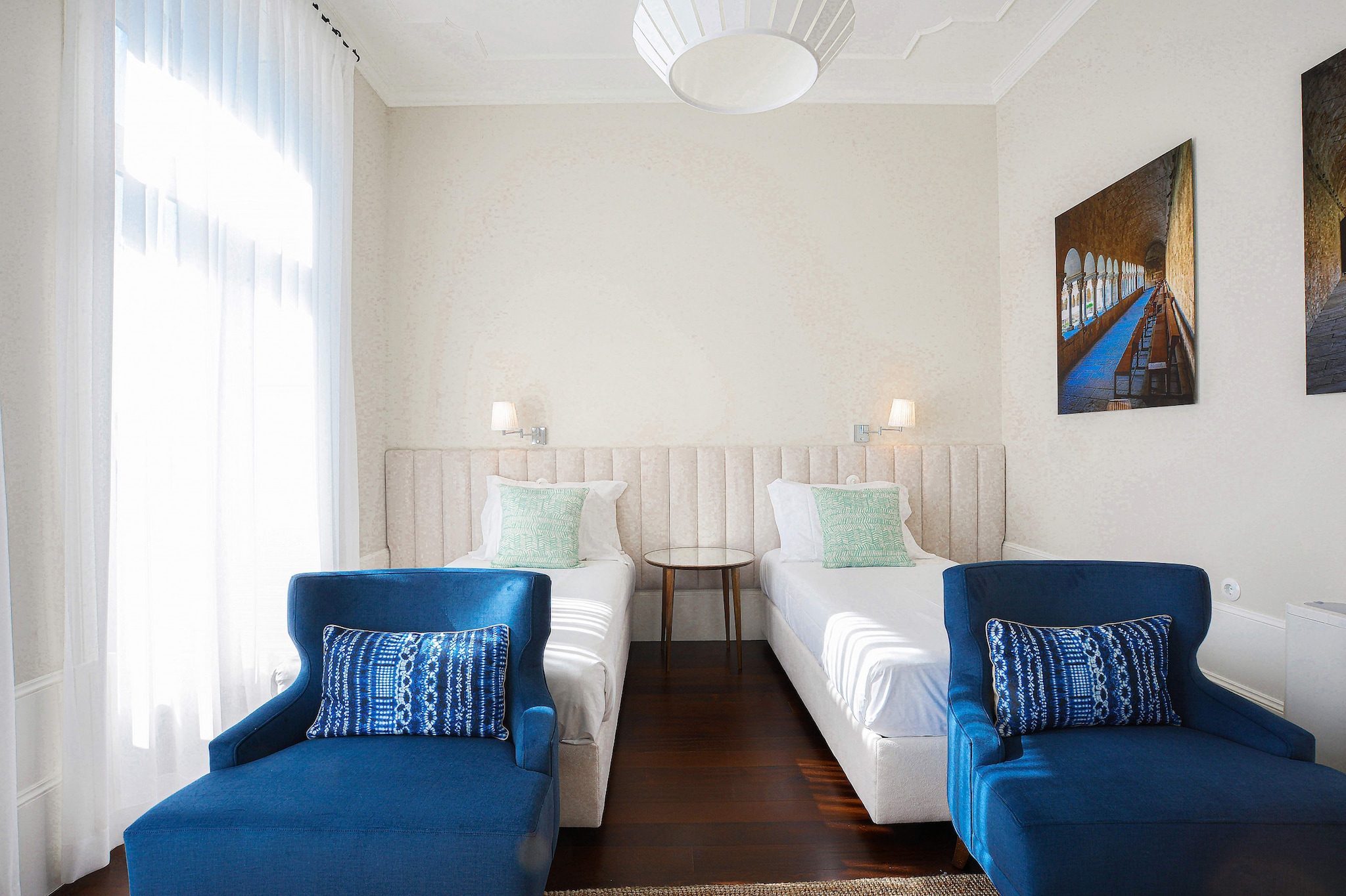 Kitchen(electric kettle, toaster, coffee machine, oven, microwave, fridge-freezer, dishes and cutlery), Living/bed room(single bed, single bed, TV(satellite), dining table(2 persons)), bathroom(shower, hairdryer), balcony, air conditioning, iron