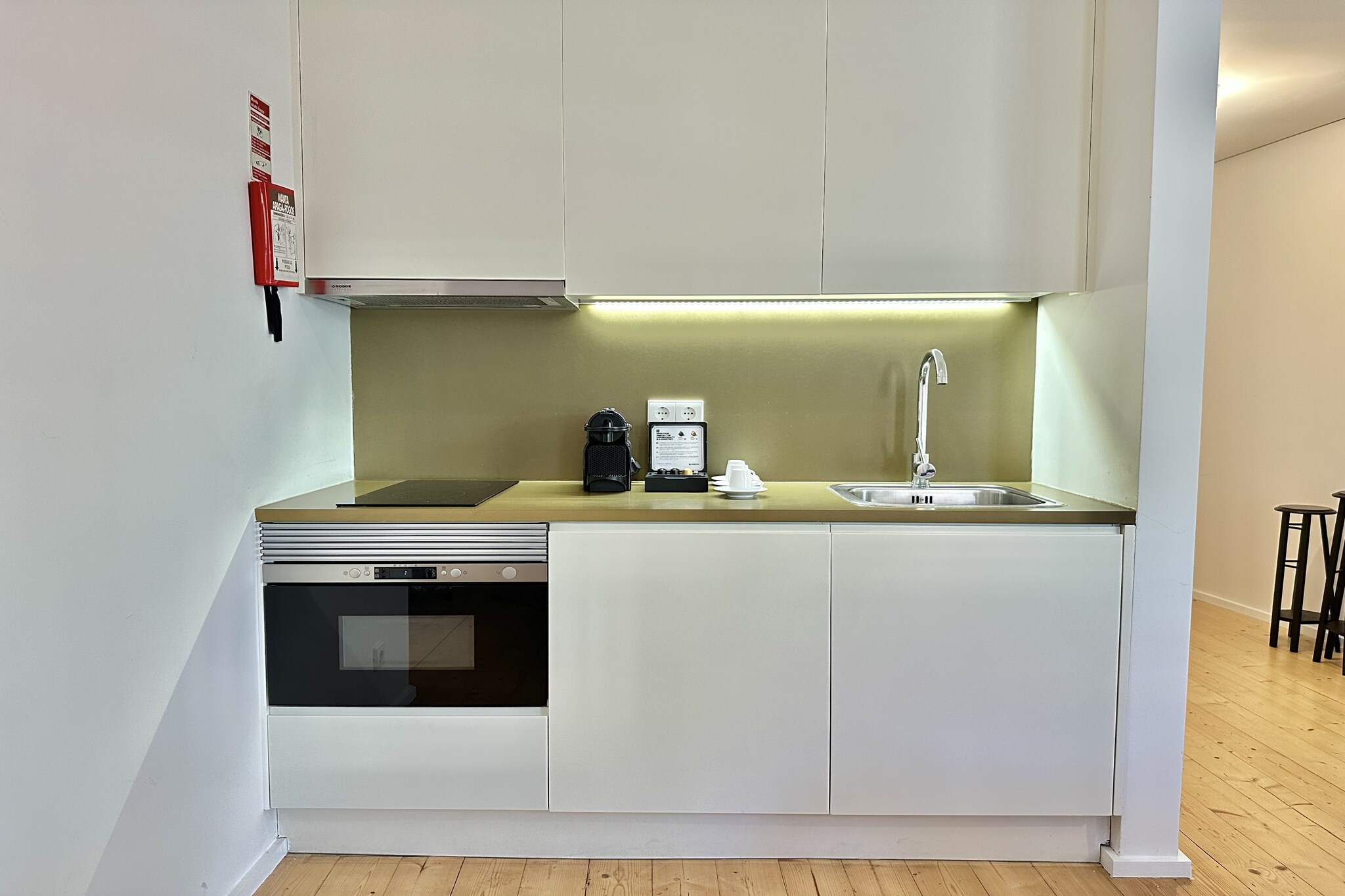 Living room(single sofa bed, TV(satellite), dining table, seating area), open kitchen(electric kettle, toaster, coffee machine, oven, microwave, fridge-freezer, dishes and cutlery), bedroom(double bed), bathroom(shower, hairdryer), Internet access, heating(electric), air conditioning, iron