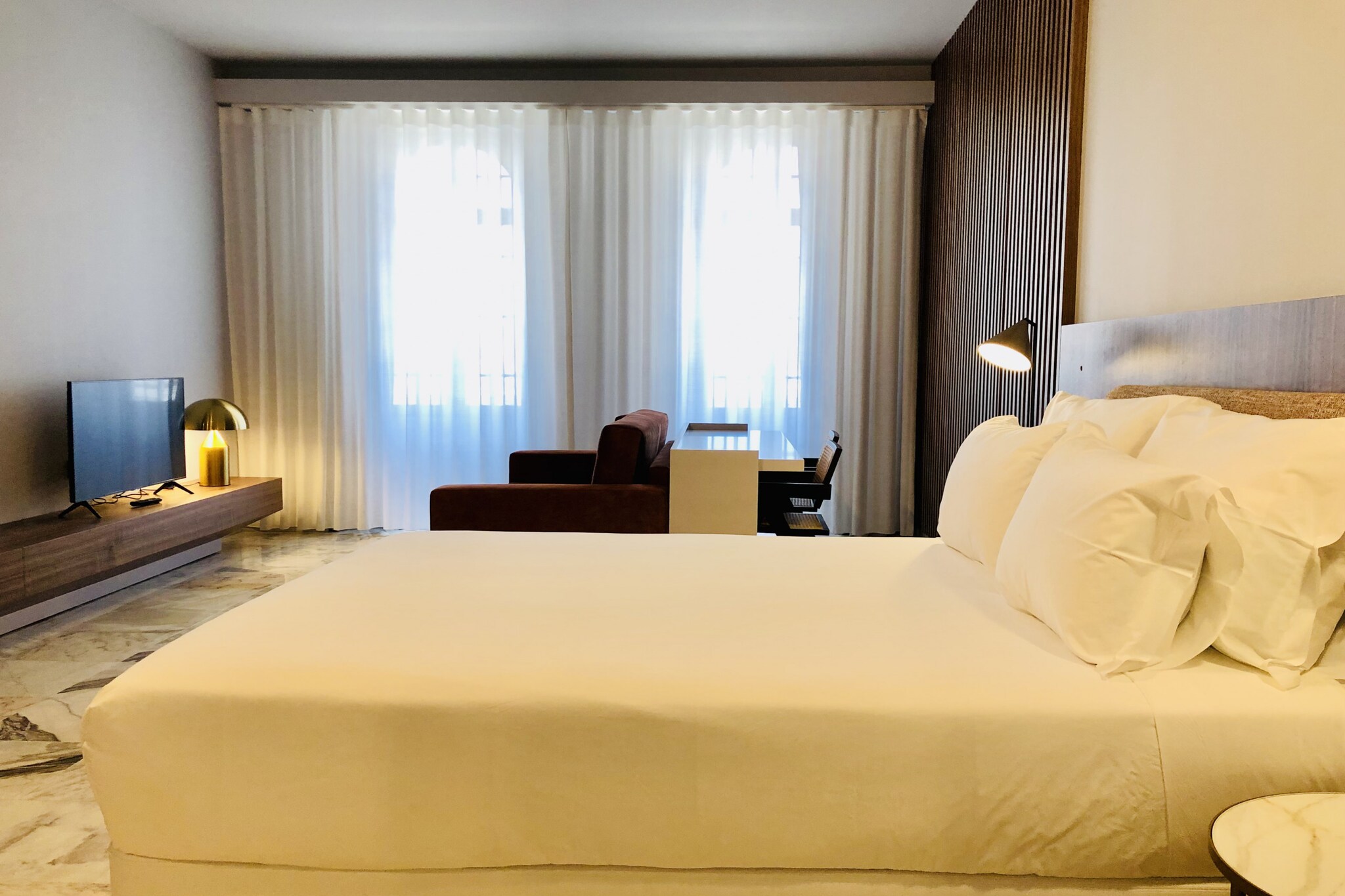 Property, along with an inviting atmosphere, offers a cozy apartment with two comfortable bedrooms, ideal for up to four guests. The home is not pet-friendly, ensuring a peaceful stay for all guests. Inside, the living area features a spacious sofa, perfect for relaxation, and a balcony for enjoying outdoor views. Additional amenities include the option to rent a baby crib and high chair, making it suitable for families with young children. The holiday home also offers free Wi-Fi, ensuring guests can stay connected during their stay.
Located in a vibrant neighborhood, the property is close to several popular attractions. Guests can explore the local cafes, boutiques, and markets that give the area its unique charm. A short walk away, you’ll find historic sites, scenic parks, and convenient public transportation options. The nearest train station and bus stops are within walking distance, offering easy access to nearby towns and cities. The nearest airport is just a short drive away, ensuring a smooth arrival and departure experience.
The property boasts a well-equipped kitchen, perfect for preparing meals during your stay. It includes a fridge, stove, microwave, and essential cooking utensils. The clean and modern washroom features a shower, towels, and complimentary toiletries. Guests can also enjoy the convenience of on-site laundry facilities. These added amenities provide everything needed for a comfortable, self-sufficient stay.