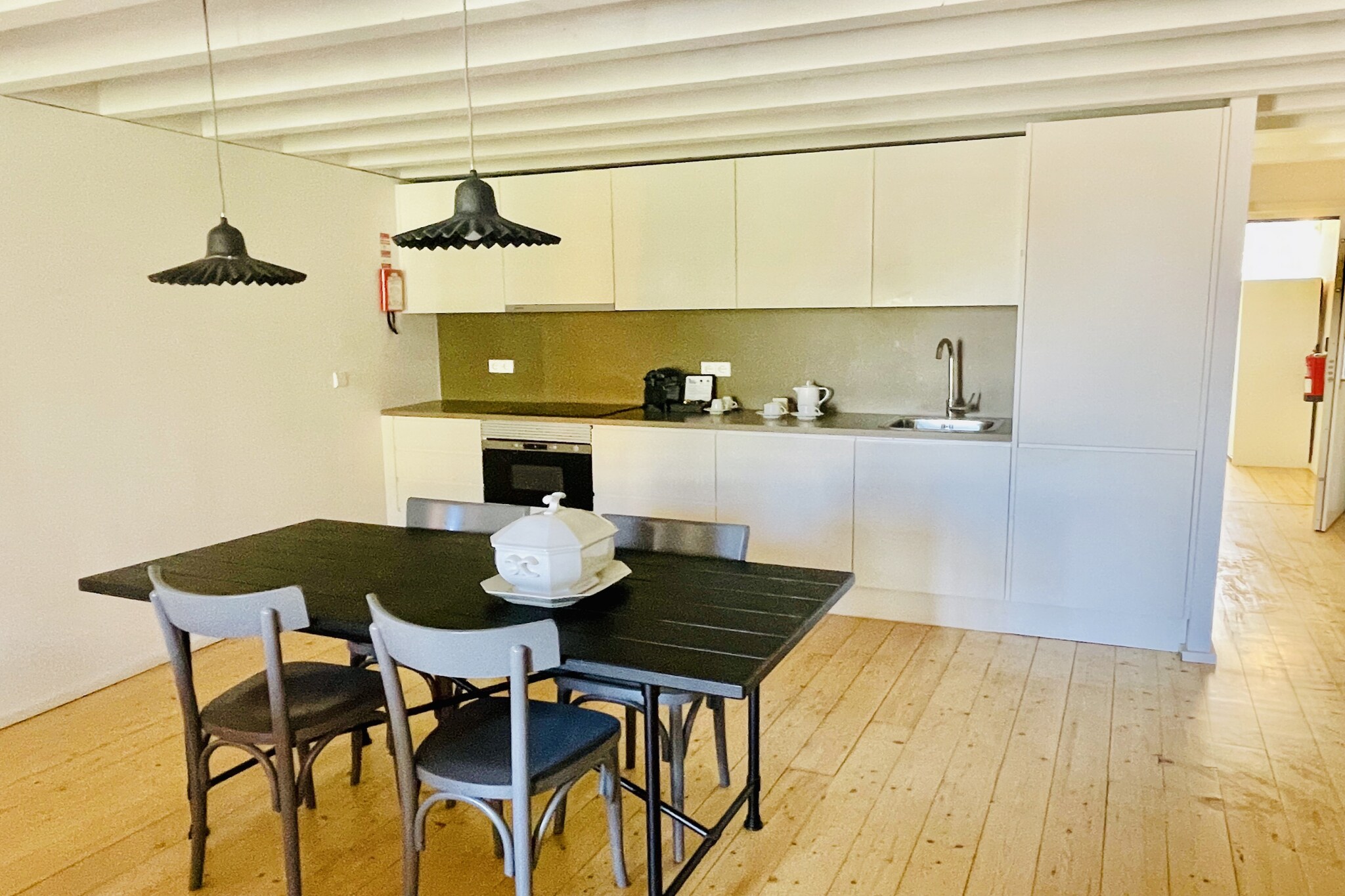 This cozy studio in Porto offers a comfortable stay with modern amenities. It features three single beds, making it ideal for solo travelers or small groups. The property is air-conditioned and includes a fully equipped independent kitchen with a hotplate, refrigerator, microwave, oven, and coffee machine. Guests can enjoy the convenience of internet access, satellite TV, and a balcony. The bathroom includes a shower and a hair dryer for added comfort. Bed linen, towels, and final cleaning are all included in the price.

Located in a prime area, the studio is just a short distance from Porto's main attractions, restaurants, and cafes, allowing guests to explore the city with ease. Public transport options, including buses and taxis, are easily accessible, making it convenient for travelers to reach the city's landmarks and nearby shopping districts. The property is also within reach of the airport, ensuring seamless travel connections.

For those who require additional services, the studio offers a baby high chair and cot/crib upon request. Parking is available on request but not included in the booking price. Please note that the studio has a no-pet policy and is designed for non-smoking guests.