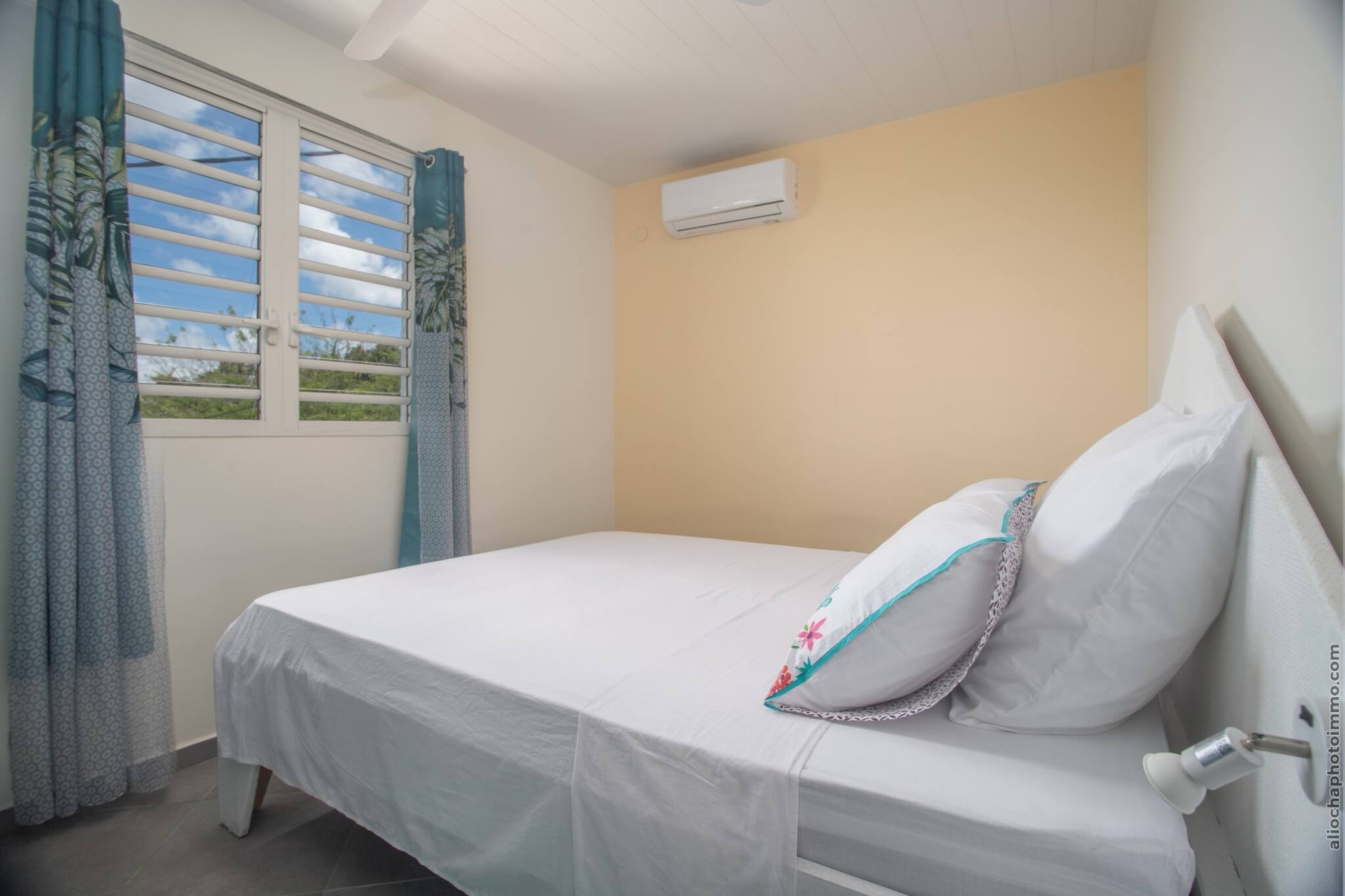 Bungalow Chic : Vue Mer & Montagne (Orange)-Slaapkamer