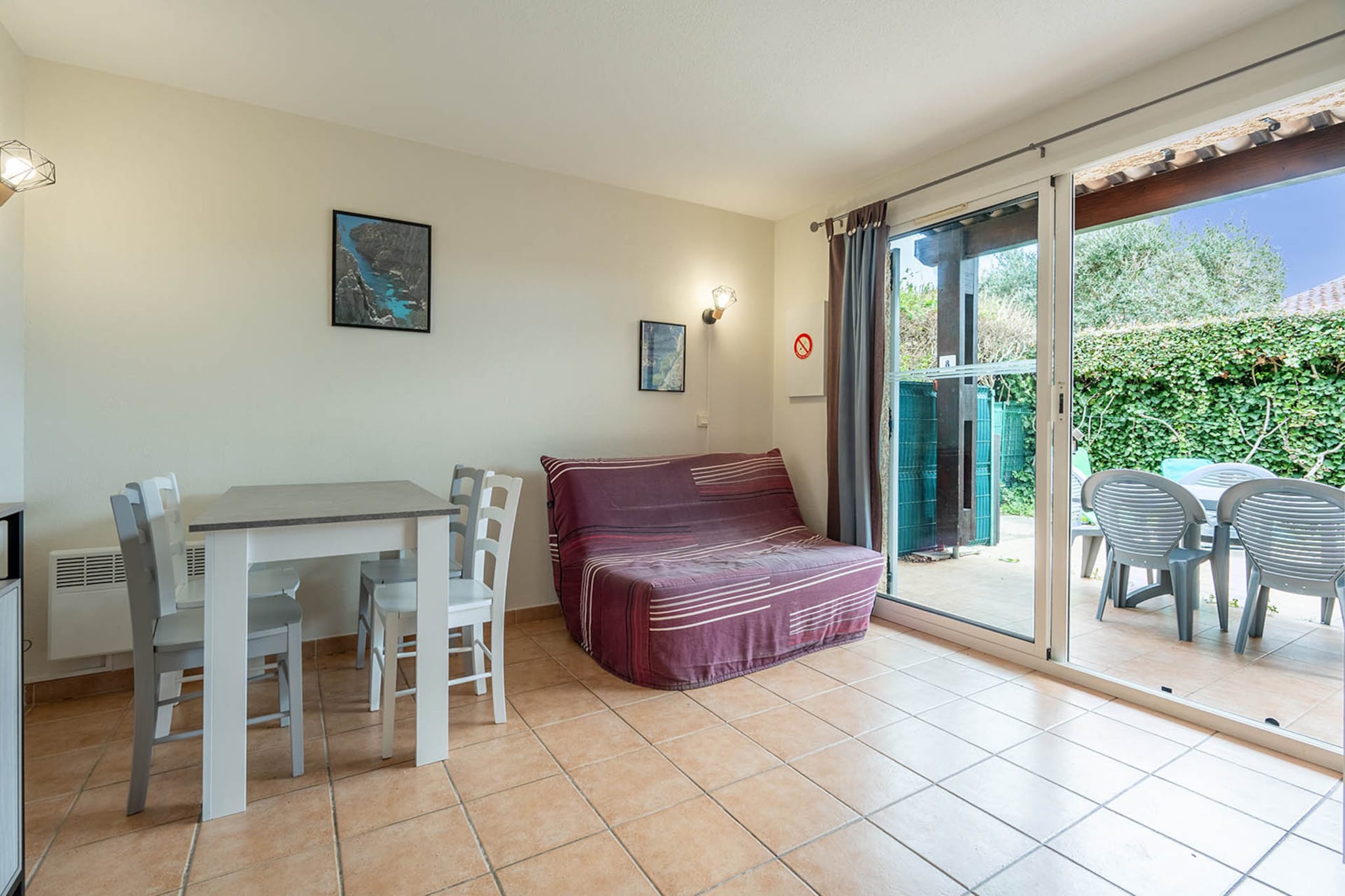 Apartment, along with its modern amenities, offers a comfortable stay for up to two guests. The apartment features one bedroom with cozy bunks, a spacious living room with a sofa, and a bathroom with a shower. It is a non-smoking accommodation, ensuring a clean and fresh environment throughout. Guests can also enjoy free private parking and access to a heated outdoor pool. The property is not pet-friendly, ensuring an allergy-free experience for all guests.

Located in Agde, the property is within a short drive to nearby attractions, including local cafes, shops, and markets, making it ideal for guests seeking both relaxation and local exploration. Beziers Cap d'Agde Airport is just 11 km away, providing convenient access for international visitors. Visitors can also easily explore the surrounding area with nearby bus stations, making the location accessible for guests traveling via public transport.

The apartment includes a fully equipped kitchen with a microwave, coffee machine, and other essential appliances, offering flexibility for meal preparation. With a well-maintained bathroom and modern facilities, guests can enjoy a hassle-free stay. Additionally, the property boasts a private terrace, perfect for relaxing outdoors while enjoying the surrounding views.