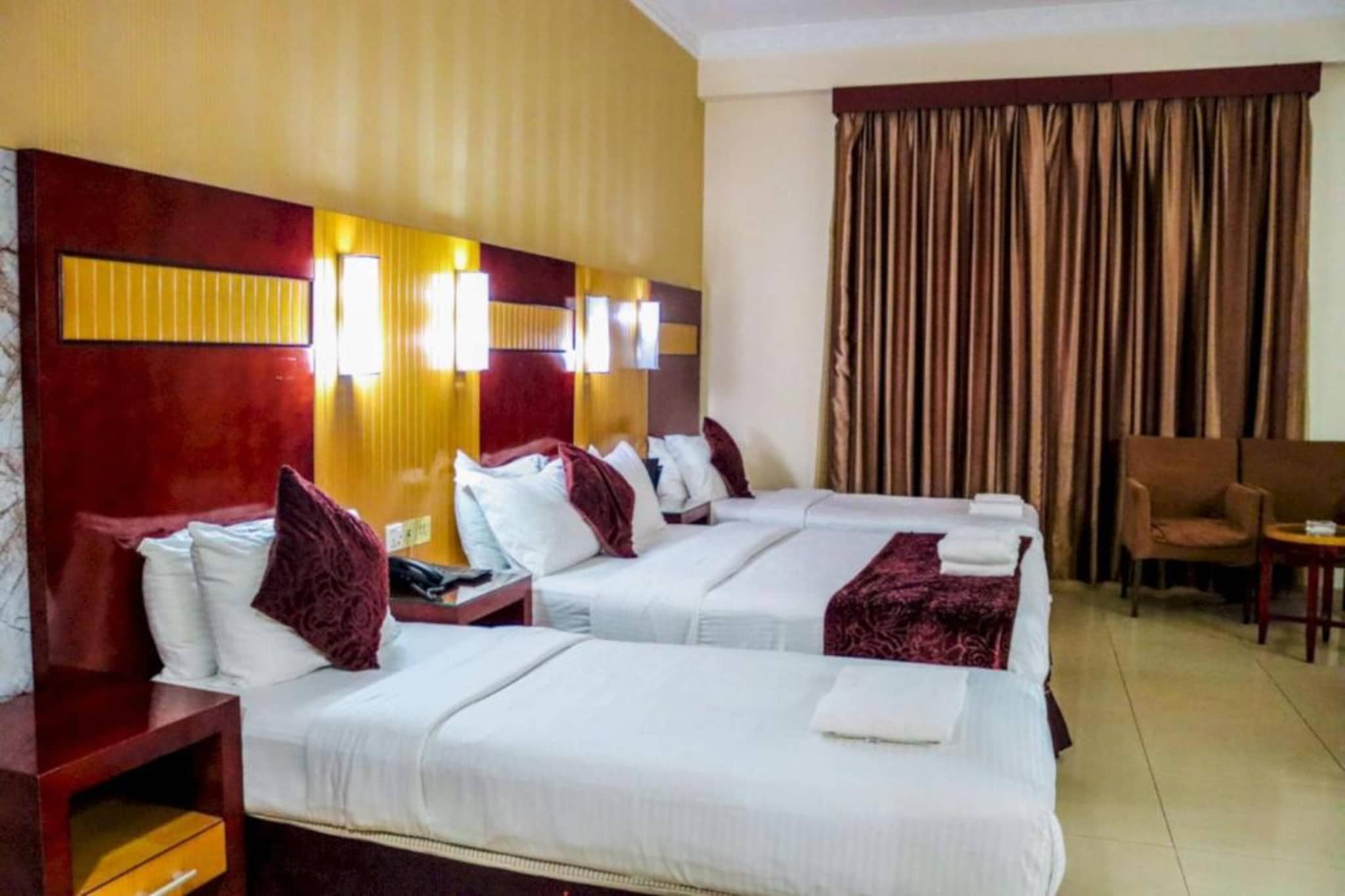 Located in the vibrant heart of Nasr Square, Luxury Triple| Phoenix Premium Stay offers a cozy and comfortable sanctuary, just a 20-minute drive from Dubai International Airport. The hotel boasts an on-site restaurant with an extensive menu for all-day dining, a relaxing spa, and complimentary Wi-Fi throughout the property.

The Luxury Triple| Phoenix Premium Stay is thoughtfully designed to provide a spacious and inviting atmosphere. The room features a flat-screen TV, minibar, and wardrobe for your convenience. The private bathroom comes with a shower, complimentary toiletries, and a hairdryer for added comfort.

For those seeking relaxation, the hotel’s spa offers soothing massage treatments, and additional services such as laundry, ironing, and car rentals can be arranged at the reception.

Conveniently located, Union Square Metro Station is just a 10-minute drive away, and Al Ghurair Mall and the famous spice souk are within 20 minutes. Whether visiting for business or pleasure, Phoenix Retreat is the ideal base for exploring Dubai.