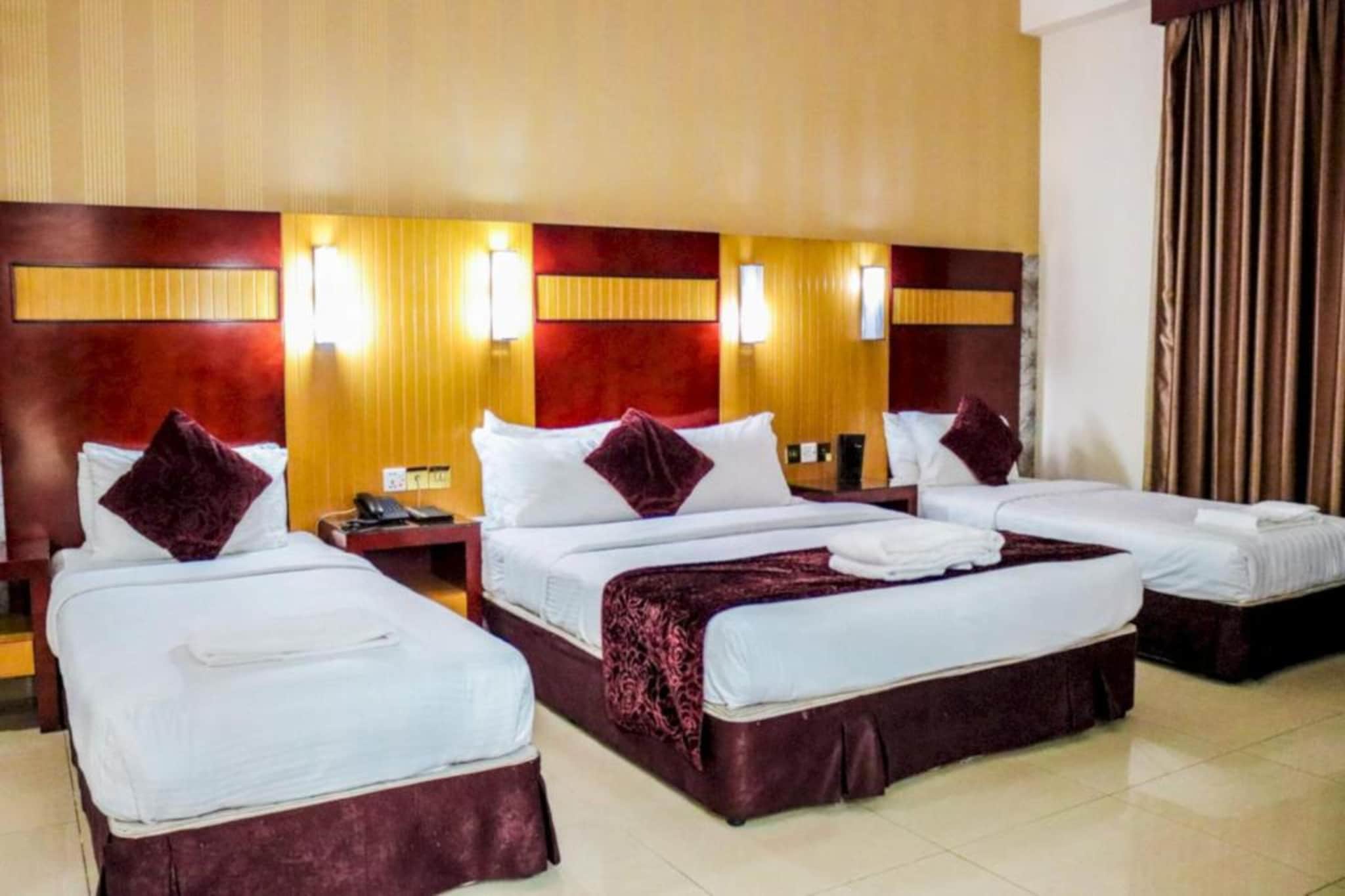 Ground floor: (bedroom(single bed, single bed, single bed, double king size bed, TV, seating area, air conditioning, telephone), bathroom(shower, toilet, bidet, hairdryer, Towels incl., shampoo, body soap))