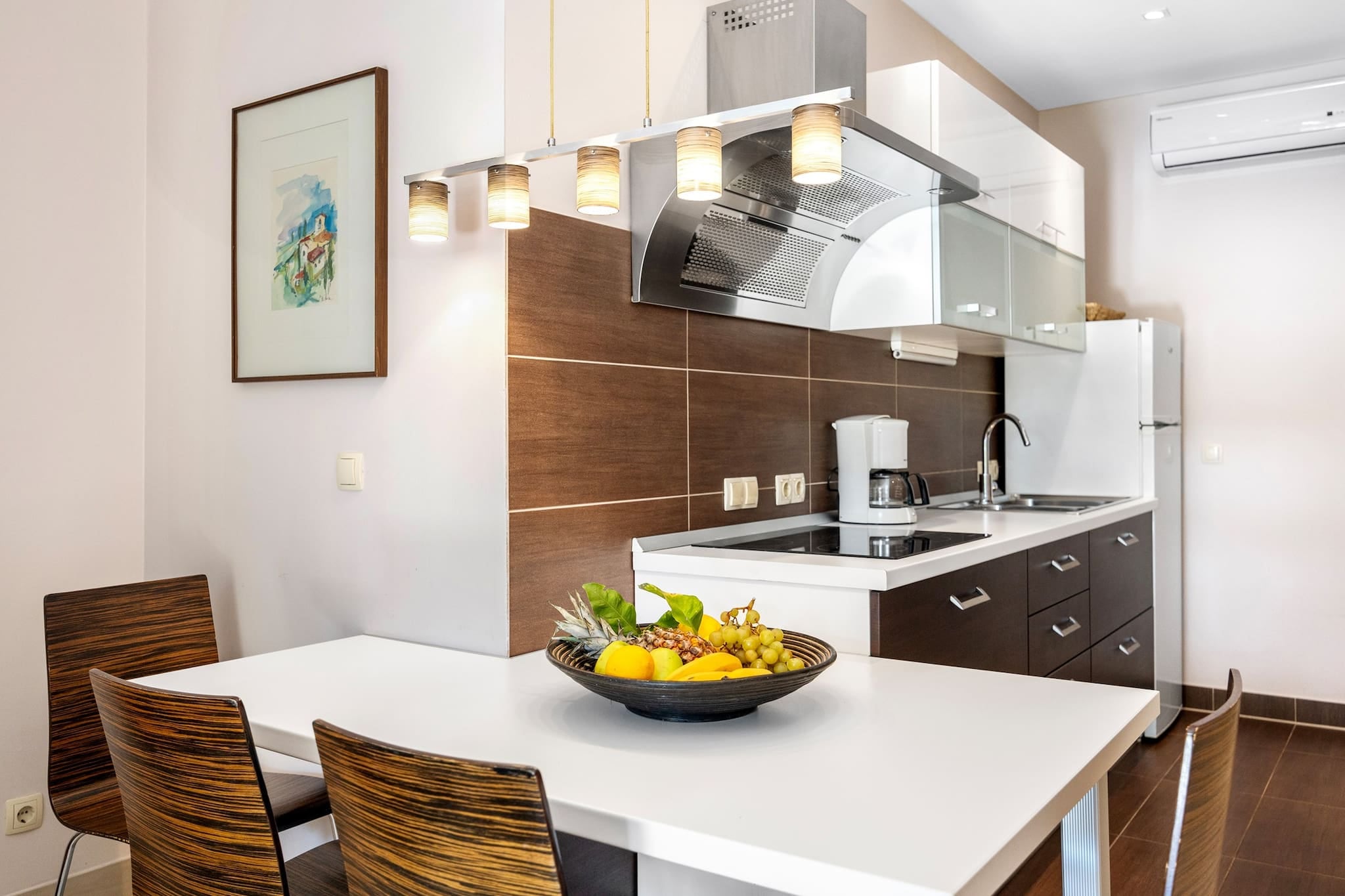 Escape to this peaceful one-bedroom apartment in Banjol, Rab, perfect for couples seeking comfort and charm. The apartment features a king-size bed, en suite bathroom, and a fully equipped kitchen for easy meal prep. Step outside to a lush garden with a shared jacuzzi and shaded lounge areas, ideal for unwinding after a beach day. A baby cot is available on request, and free private parking is included. A â‚¬40 final cleaning fee applies.

Just 250 meters from a sandy beach, the location is ideal for exploring Rabâ€™s coastline and historic sites. Wander through Old Town Rab, visit the ruins of St. Damianâ€™s fortress, or enjoy fresh seafood at local restaurants. The nearby Komrcar forest park offers cool, scenic walks.

Modern amenities include air conditioning, Wi-Fi, and a TV. Guests can also grill meals in the gardenâ€™s barbecue area. This non-smoking, pet-free retreat blends comfort, nature, and convenience for a memorable island stay.